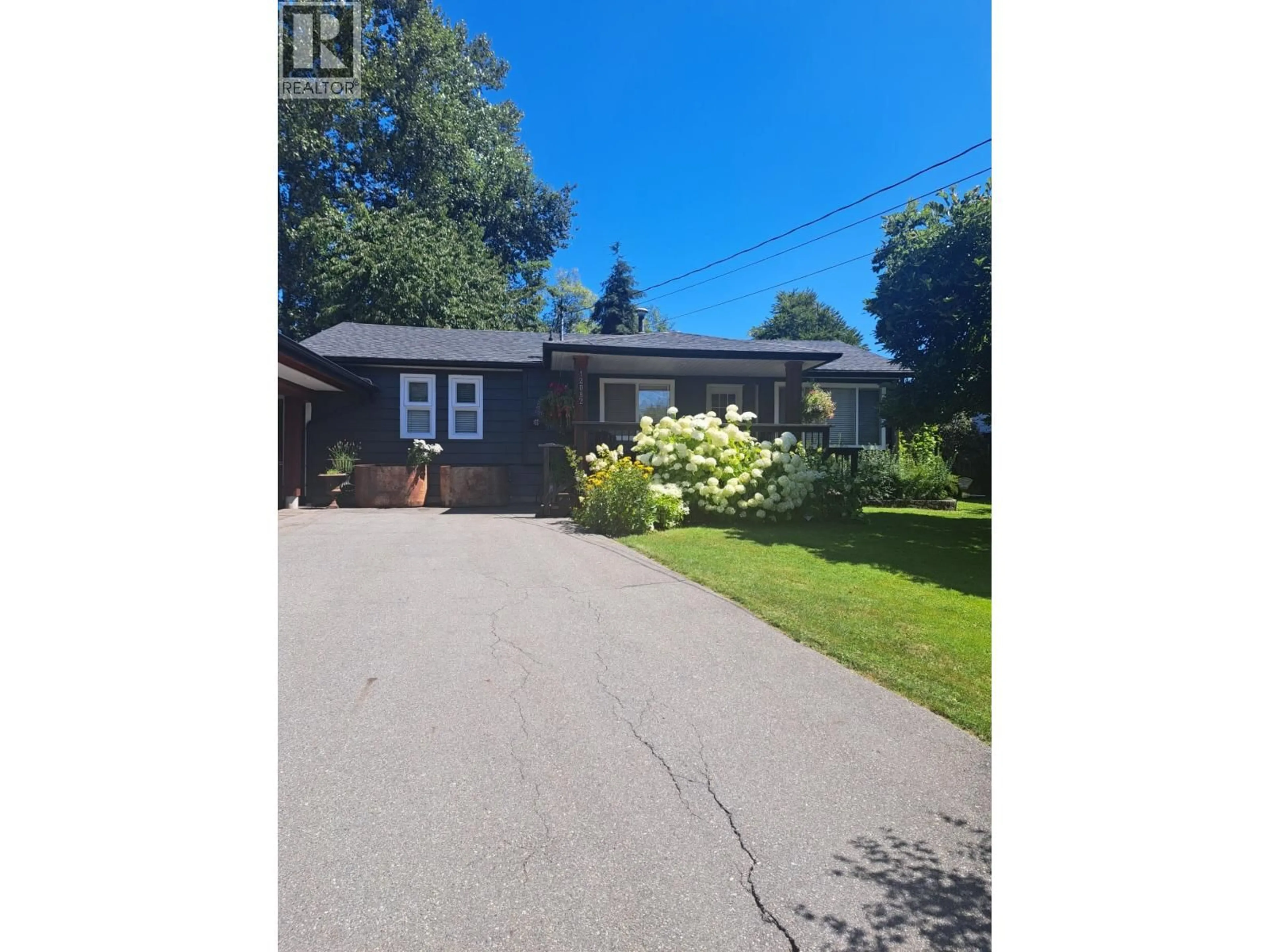A pic from outside/outdoor area/front of a property/back of a property/a pic from drone, street for 12082 261 STREET, Maple Ridge British Columbia V2W2A6