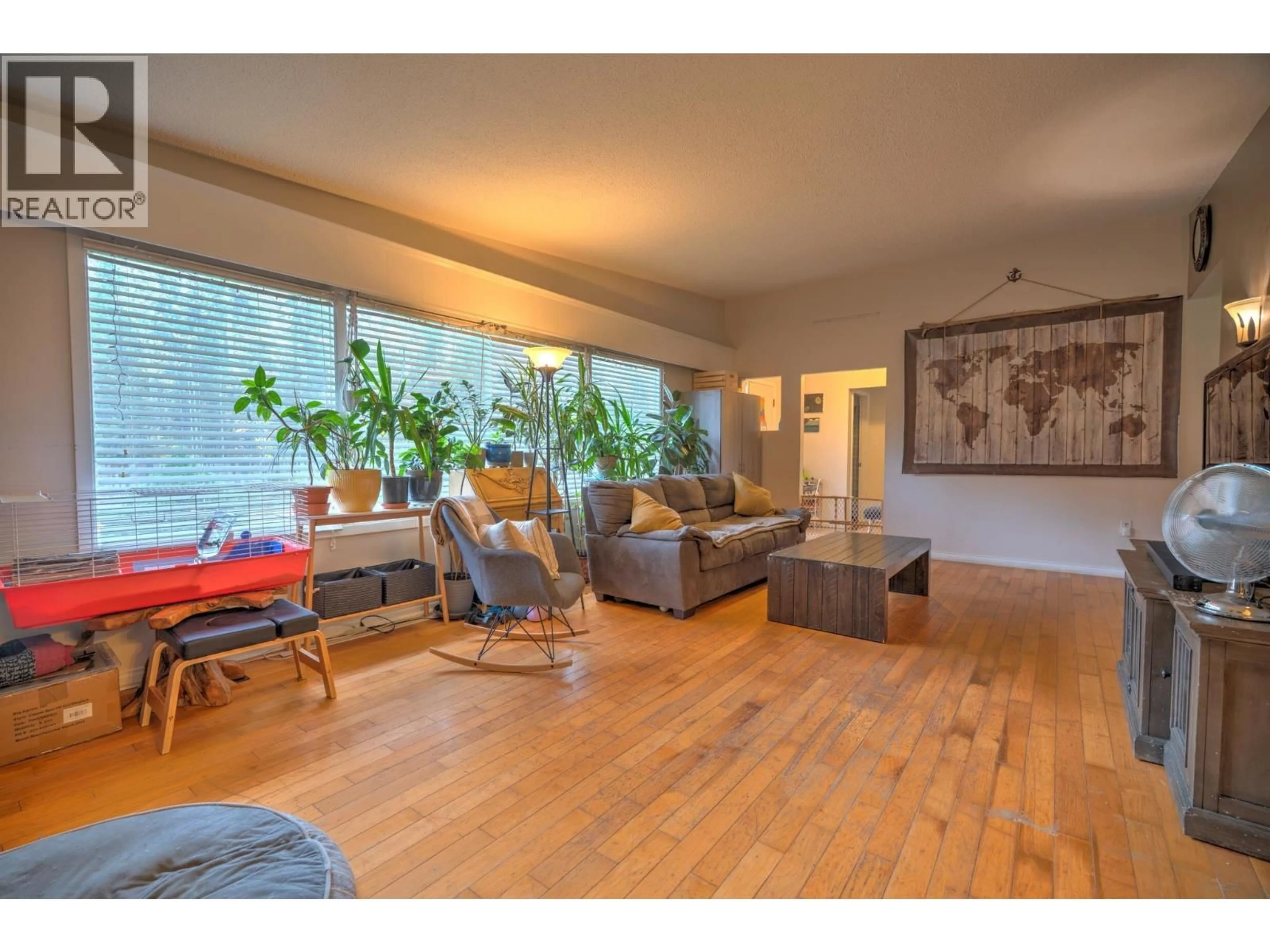 Living room with furniture, wood/laminate floor for 1346 NORTH NECHAKO ROAD, Prince George British Columbia V2K1A6