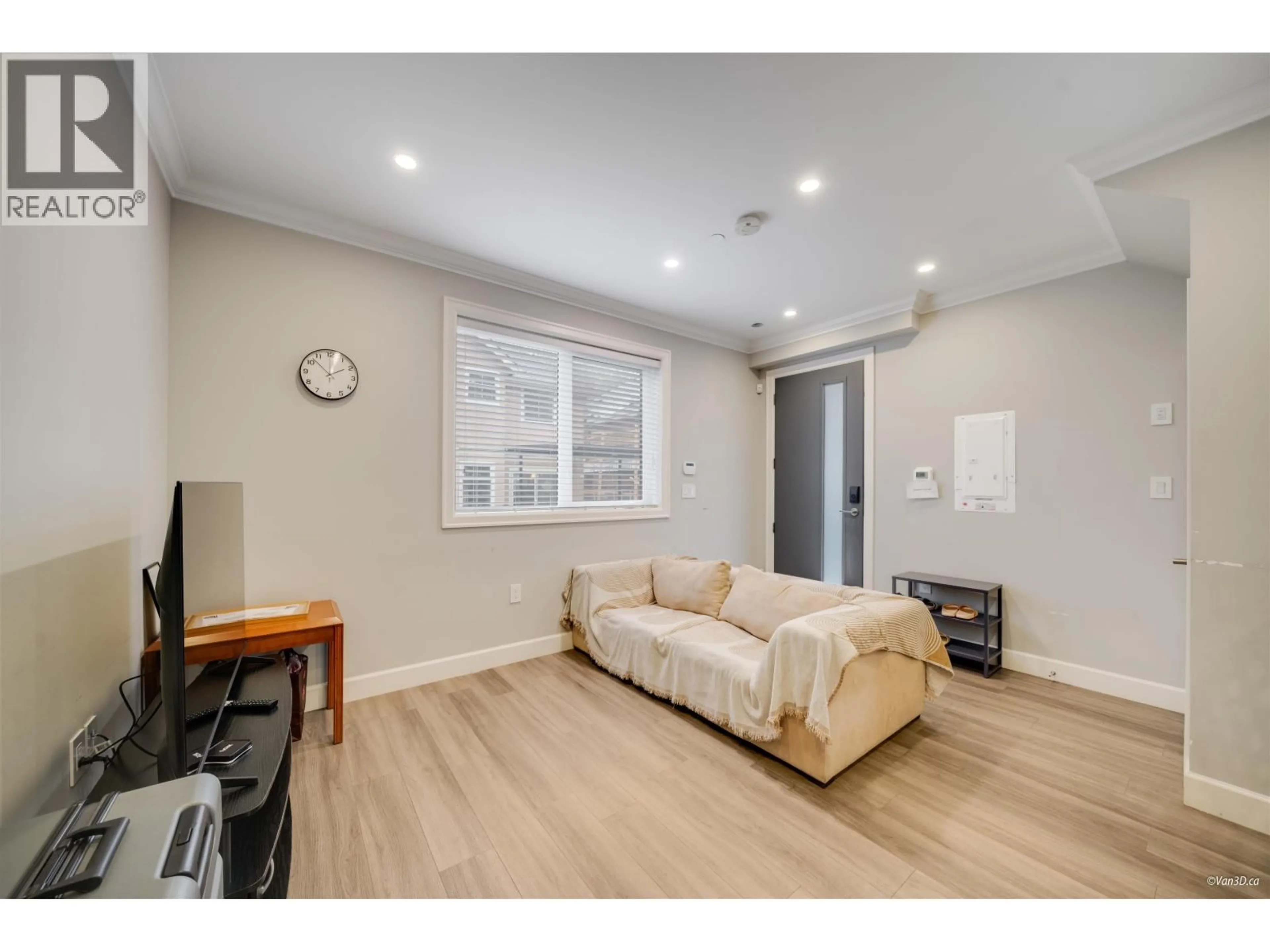 Living room with furniture, wood/laminate floor for 3657 29TH AVENUE, Vancouver British Columbia V6S1T5