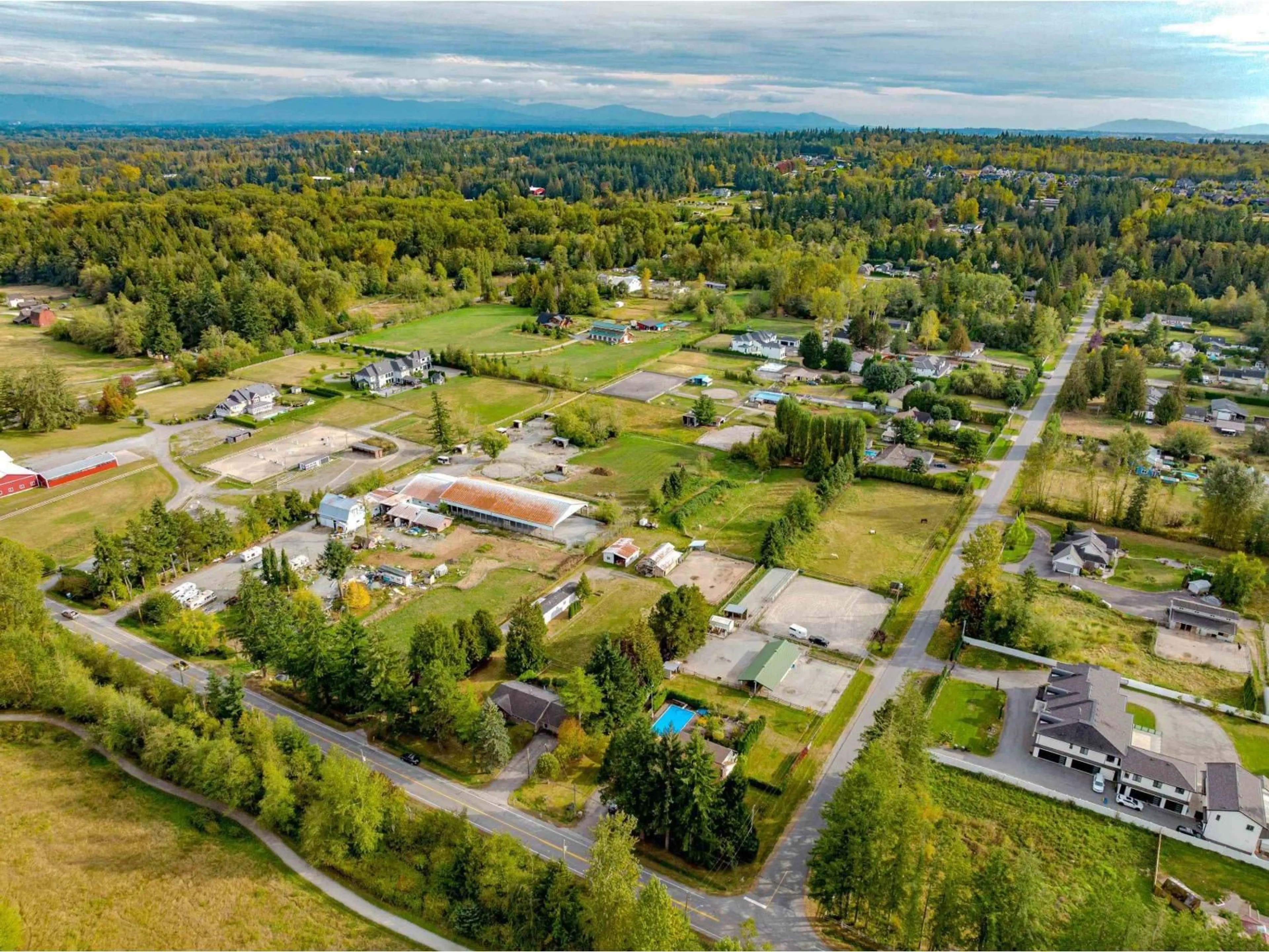 A pic from outside/outdoor area/front of a property/back of a property/a pic from drone, mountain view for 20228 8, Langley British Columbia V2Z1V6