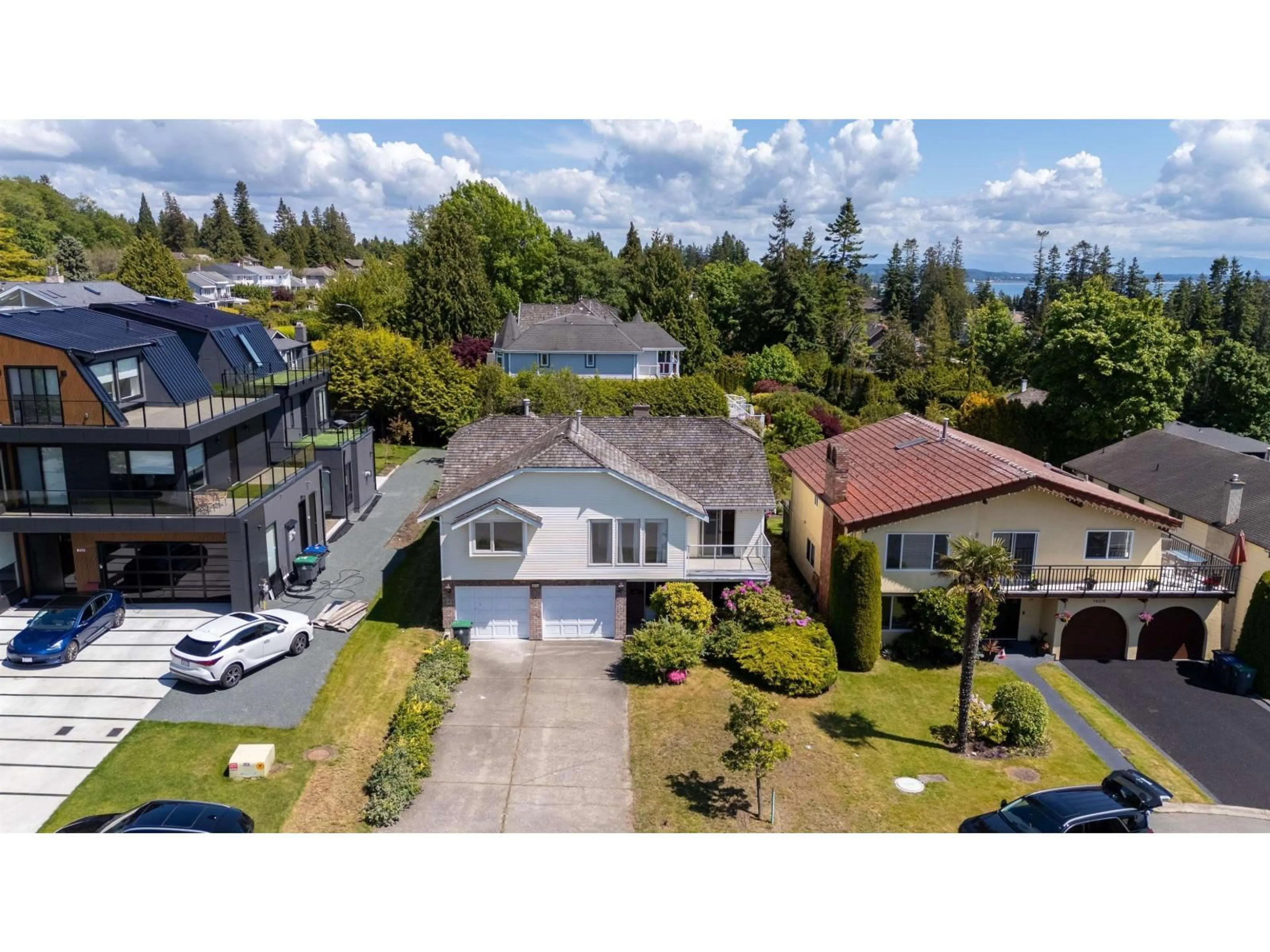 A pic from outside/outdoor area/front of a property/back of a property/a pic from drone, street for 1414 132B, White Rock British Columbia V4A6H7