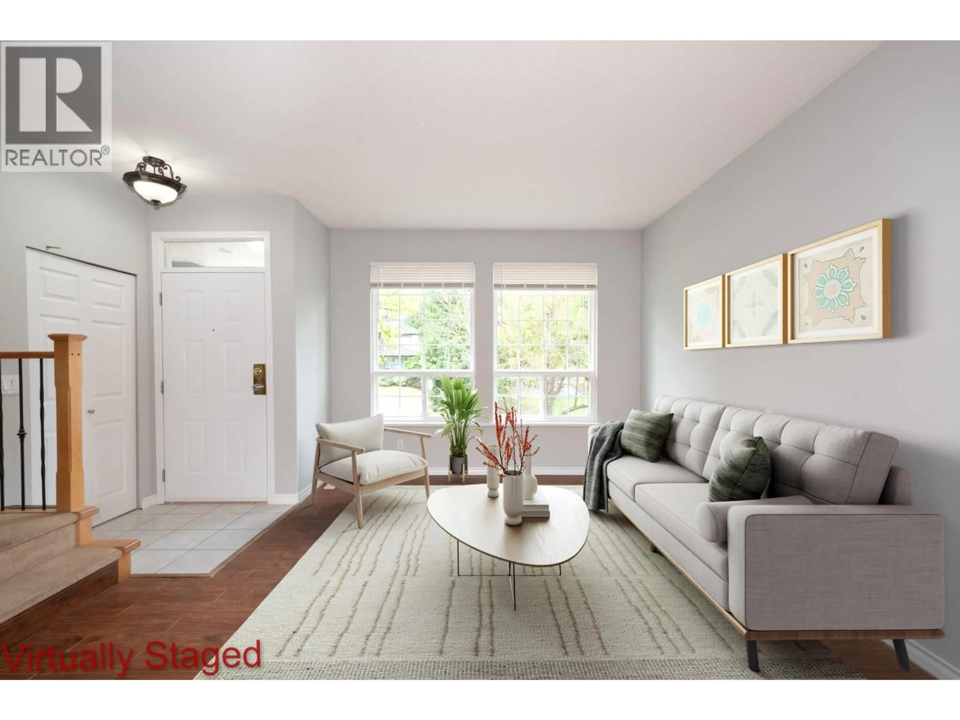 Living room with furniture, wood/laminate floor for 24105 102 AVENUE, Maple Ridge British Columbia V2W2A2