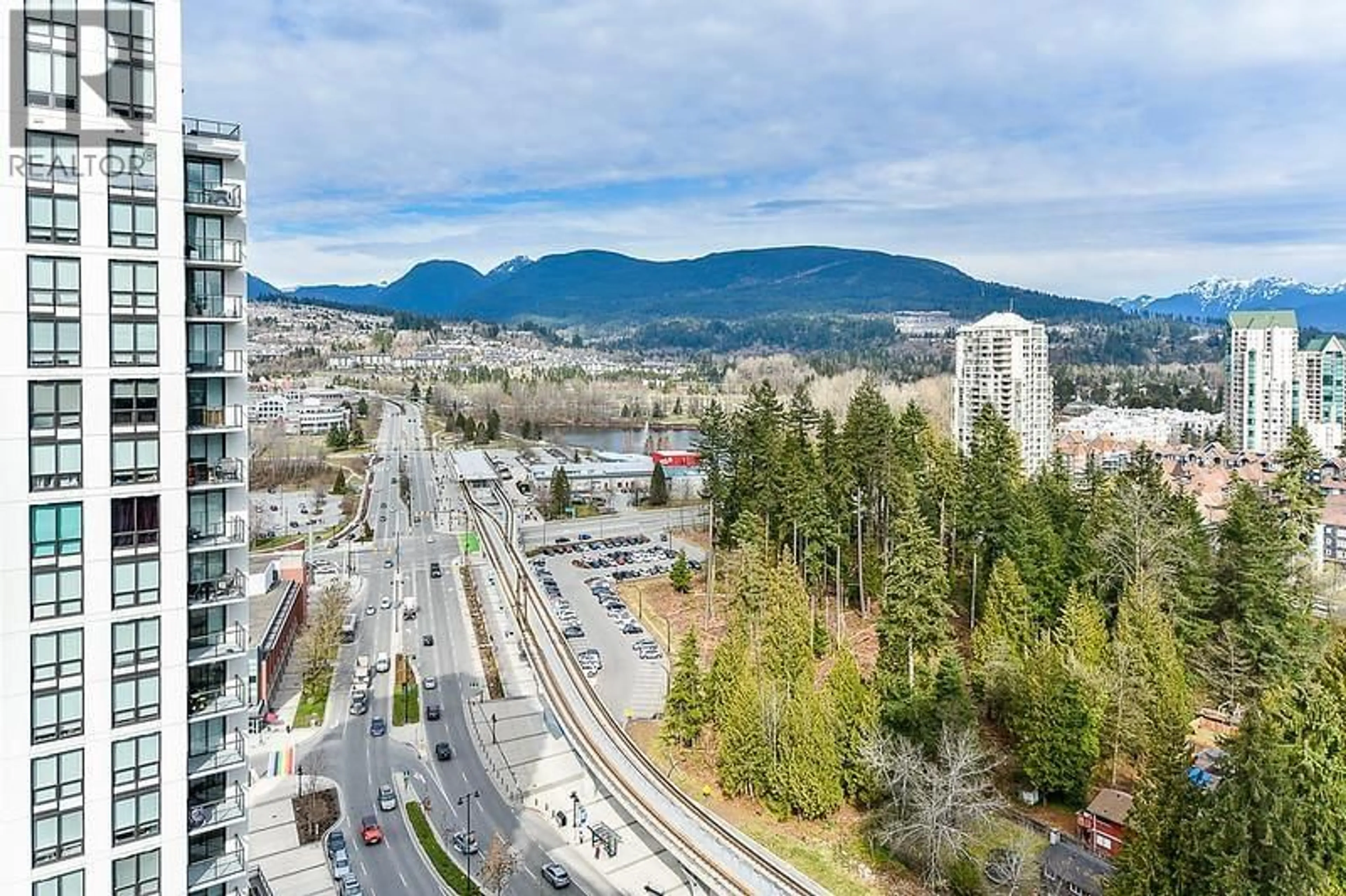 A pic from outside/outdoor area/front of a property/back of a property/a pic from drone, mountain view for 2605 - 3008 GLEN DRIVE, Coquitlam British Columbia V3B0J5