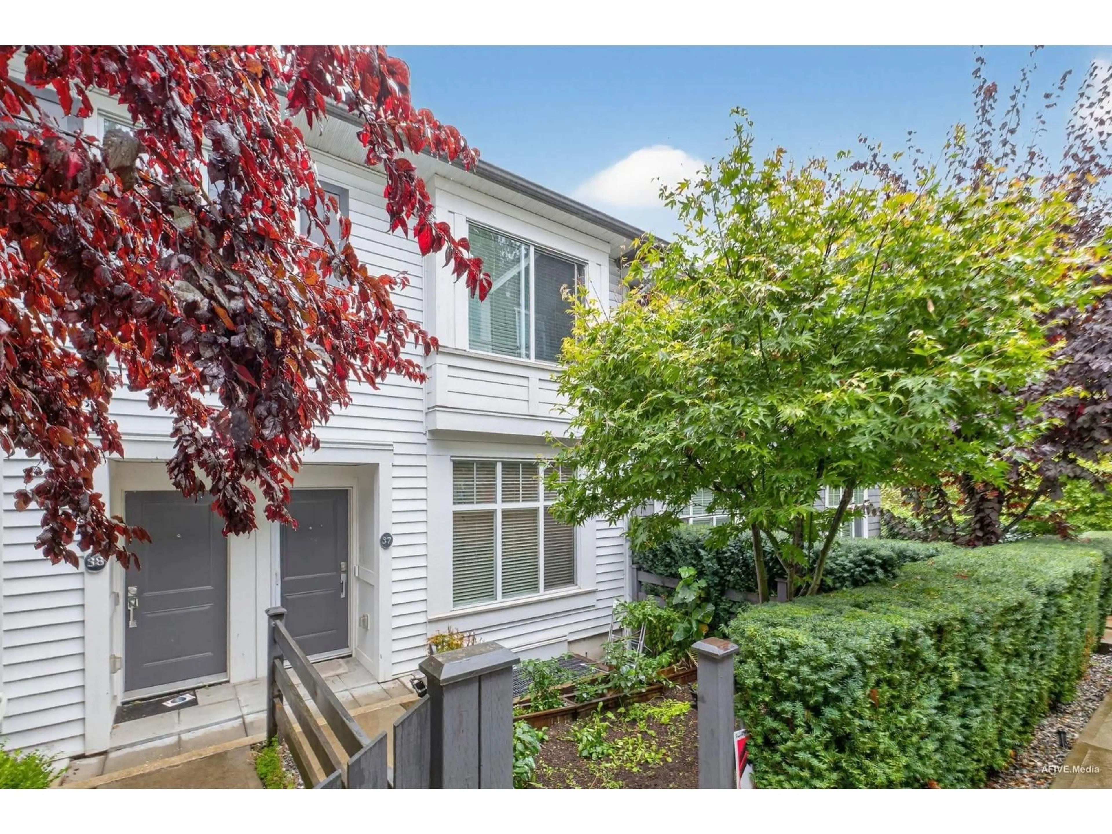 A pic from outside/outdoor area/front of a property/back of a property/a pic from drone, street for 37 - 8130 136A, Surrey British Columbia V3W1H9
