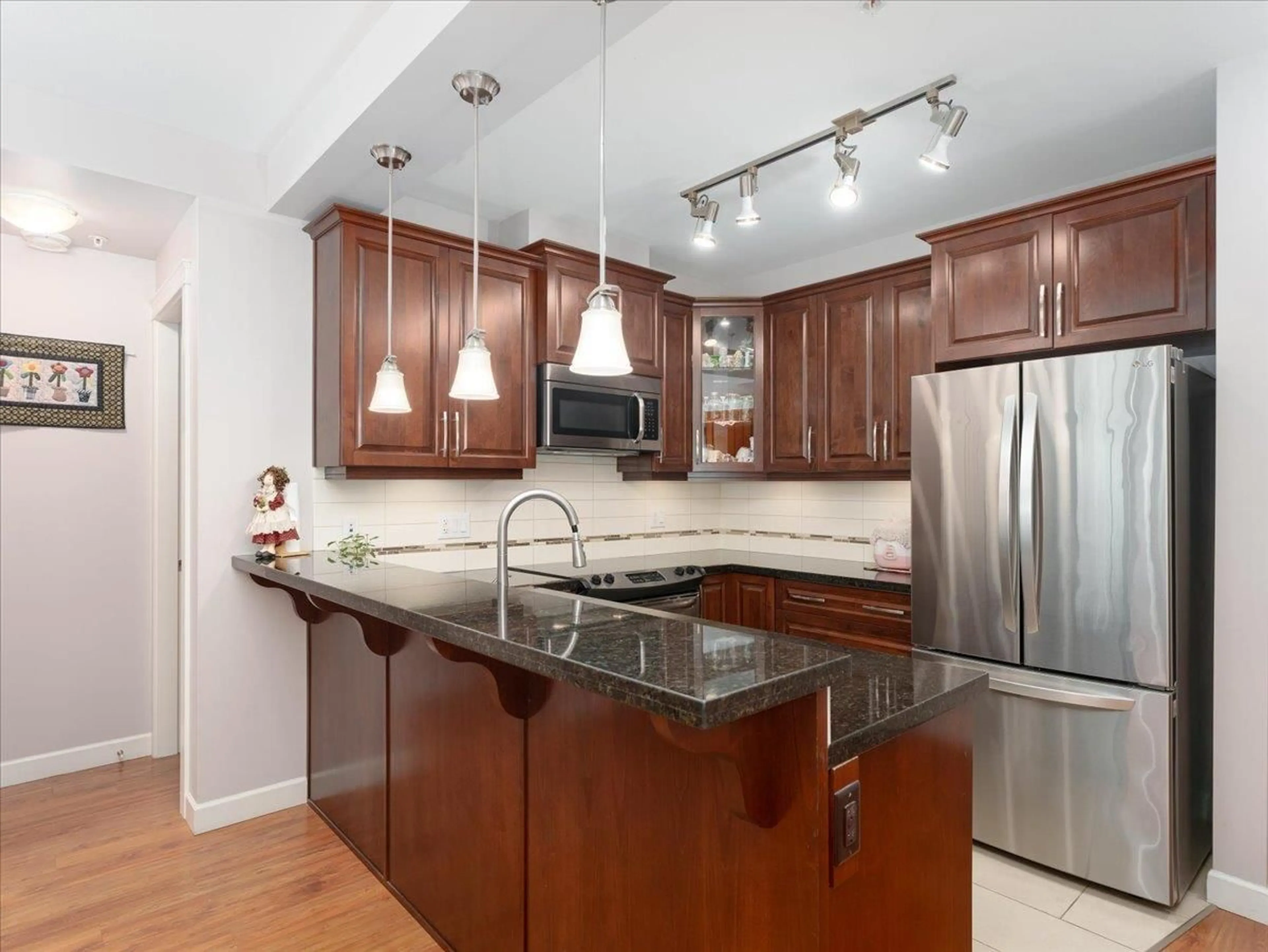 Open concept kitchen, unknown for 225 - 8288 207A, Langley British Columbia V2Y0L2