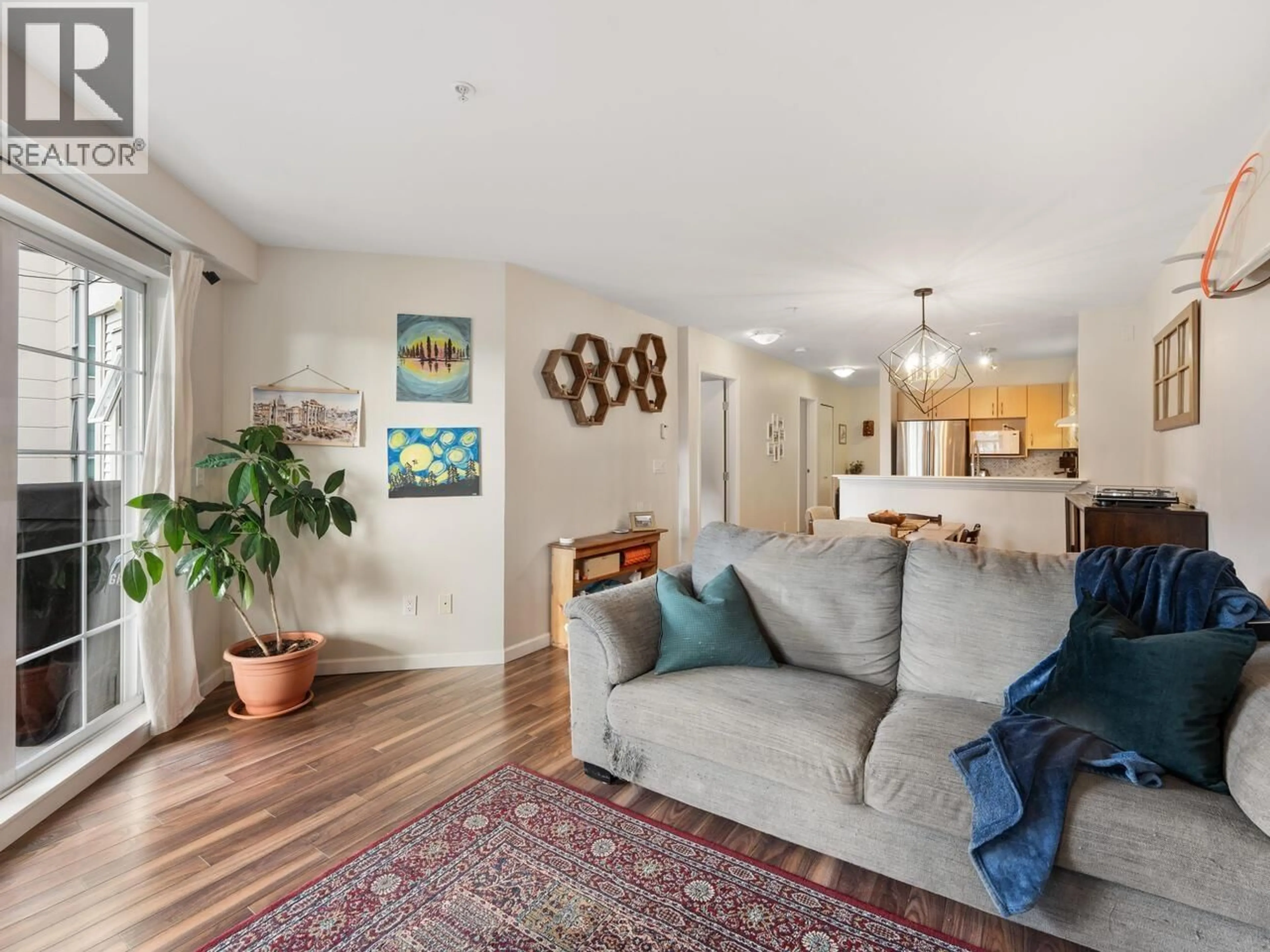 Living room with furniture, unknown for 218 - 147 1ST STREET, North Vancouver British Columbia V7L1B2