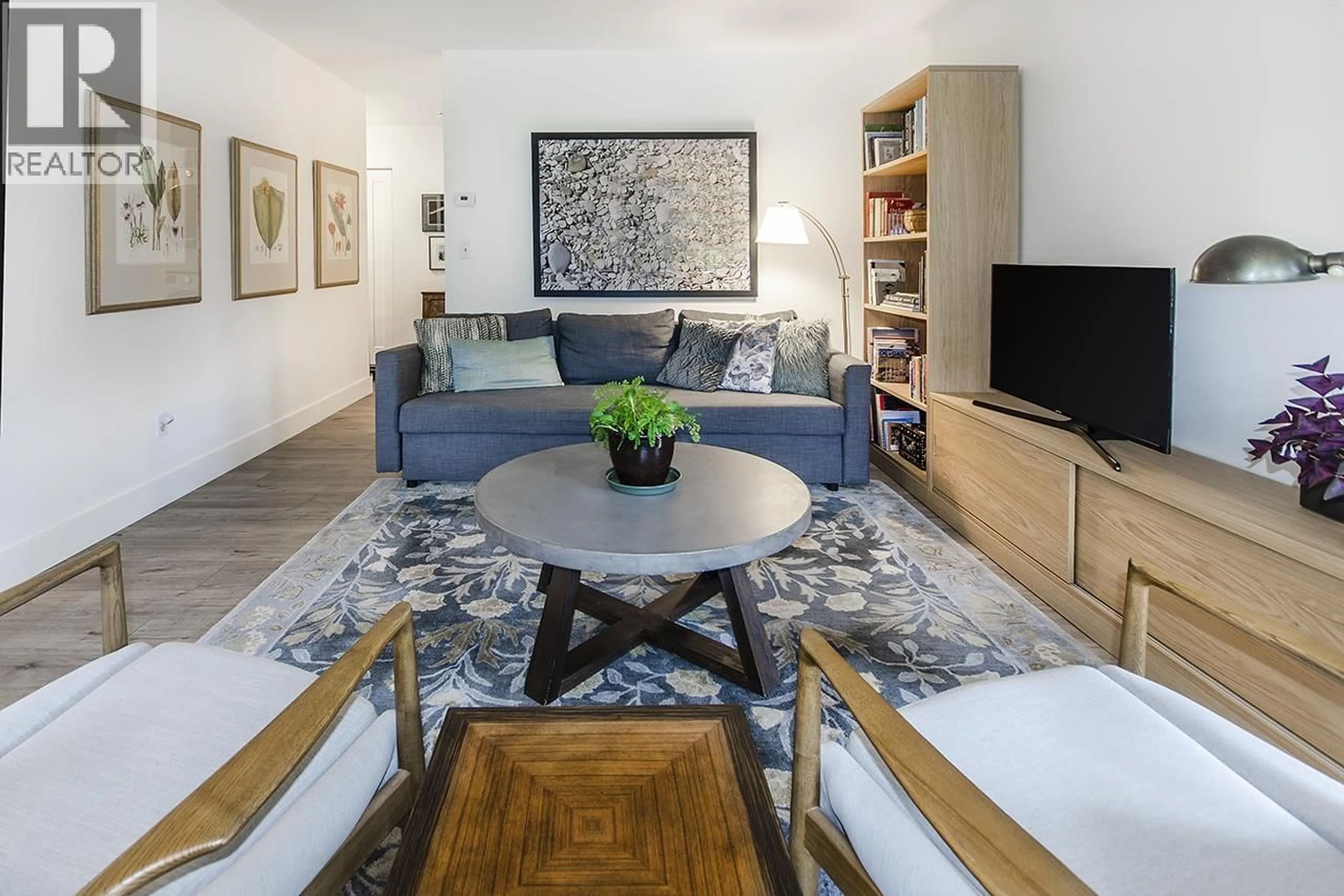 Living room with furniture, unknown for 211 - 235 KEITH ROAD, West Vancouver British Columbia V7T1L5