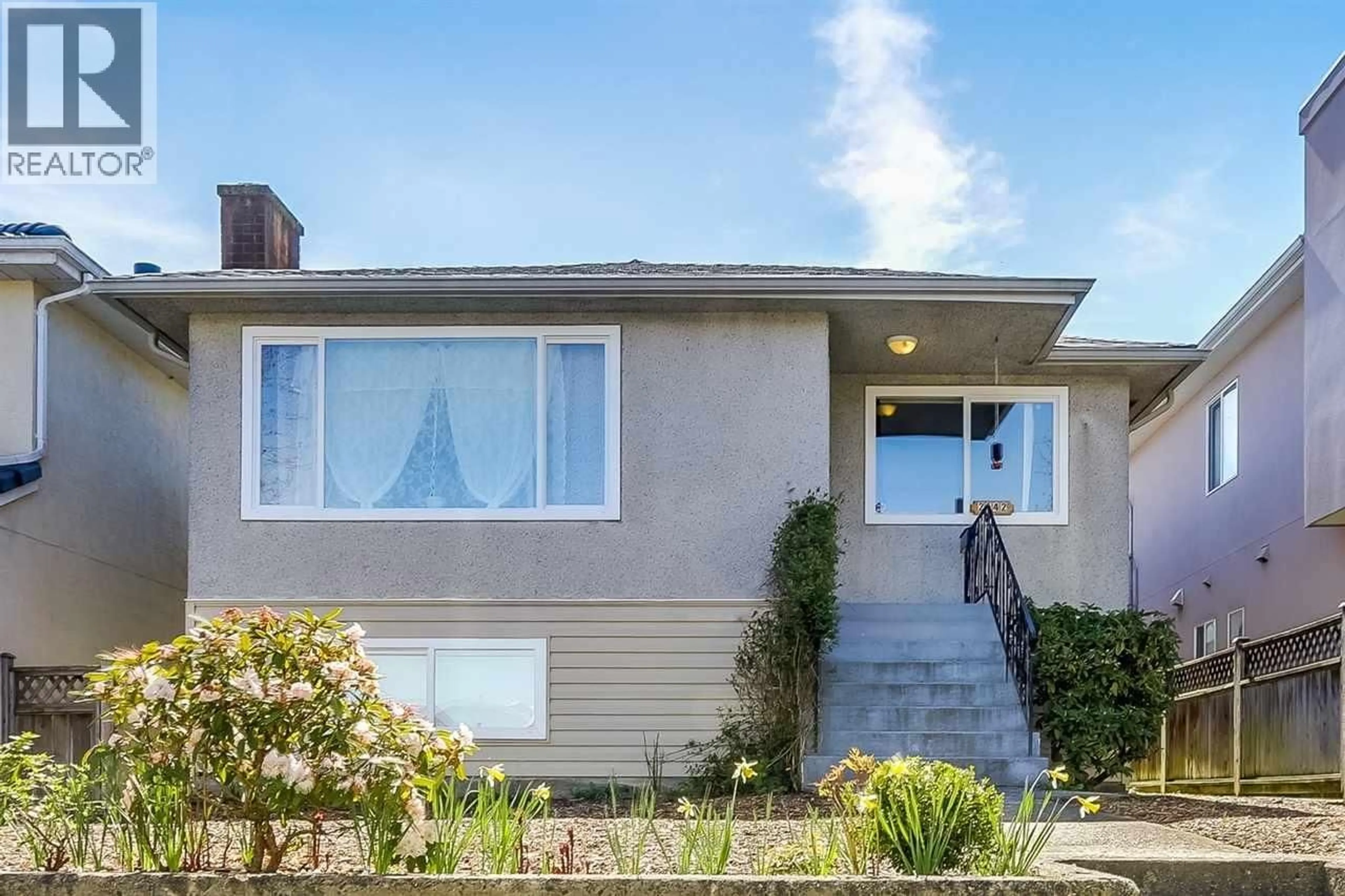 Home with vinyl exterior material, street for 2542 28TH AVENUE, Vancouver British Columbia V5R1R6