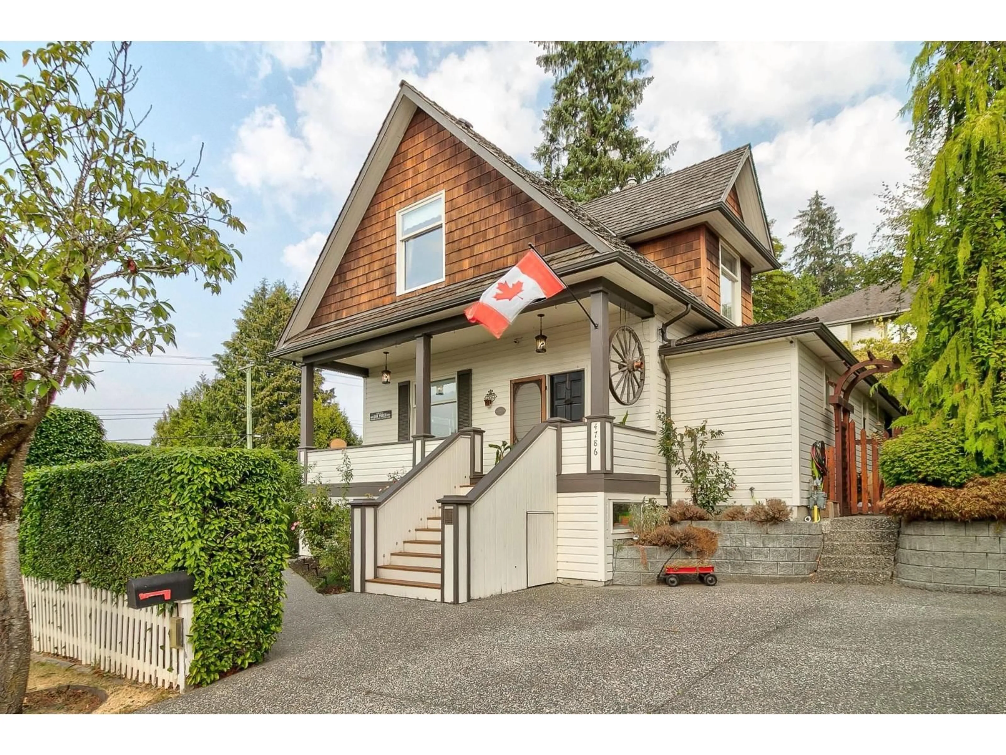 Home with vinyl exterior material, street for 4786 217A, Langley British Columbia V3A2N7