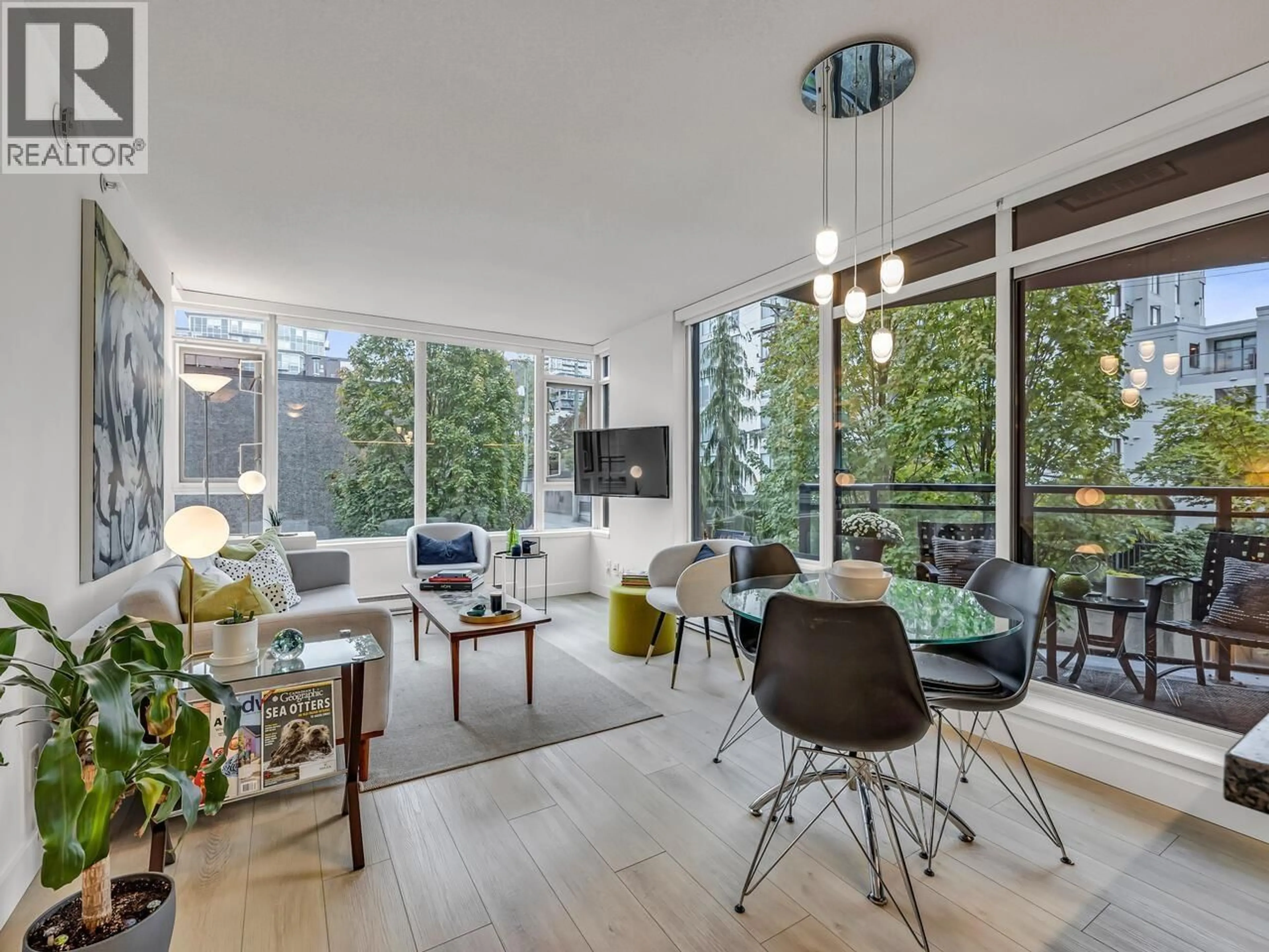 Living room with furniture, wood/laminate floor for 301 - 1650 7TH AVENUE, Vancouver British Columbia V6J5N1