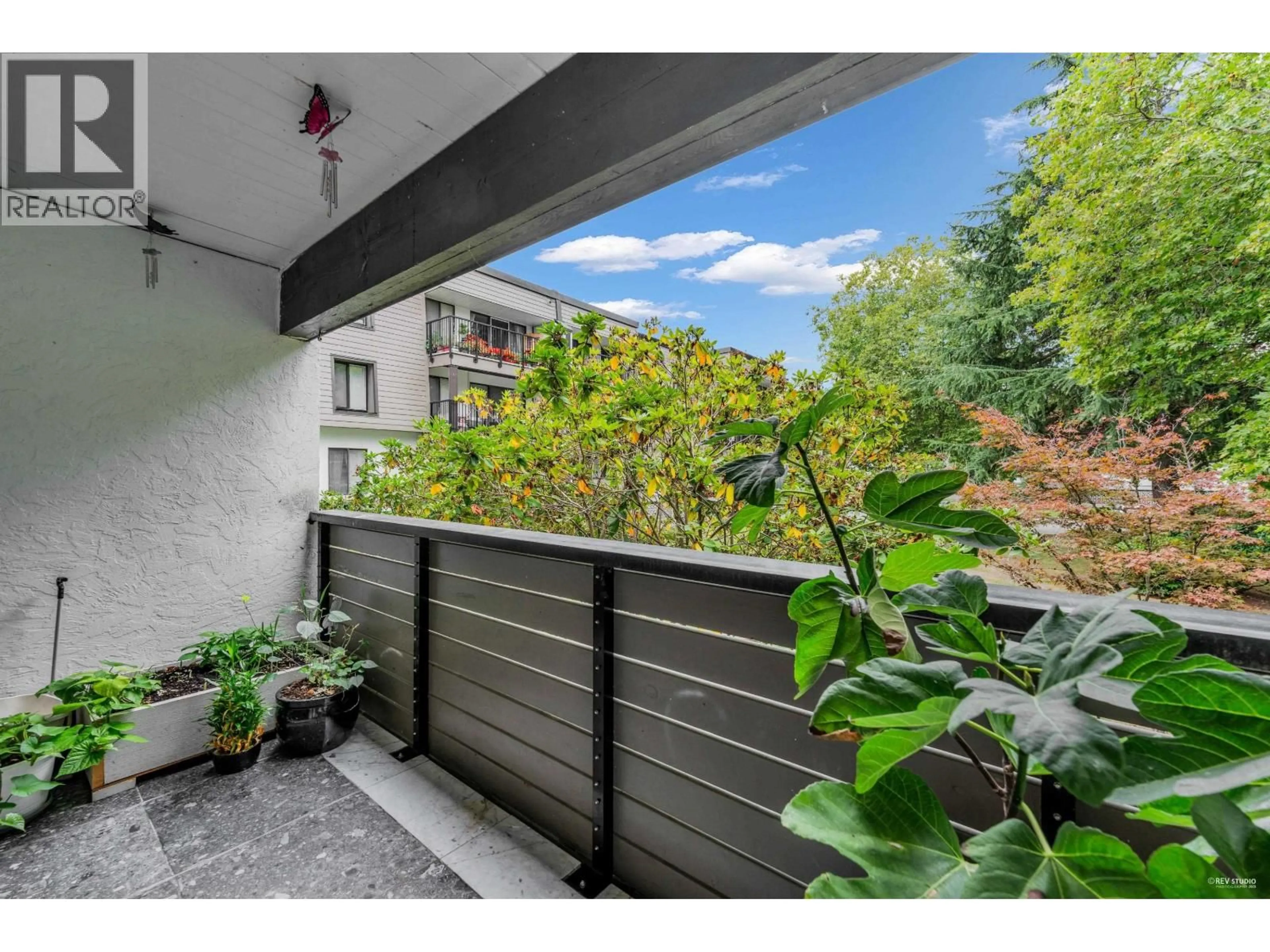 Balcony in the apartment, city buildings view from balcony for 104 - 8880 NO. 1 ROAD, Richmond British Columbia V7C4C1