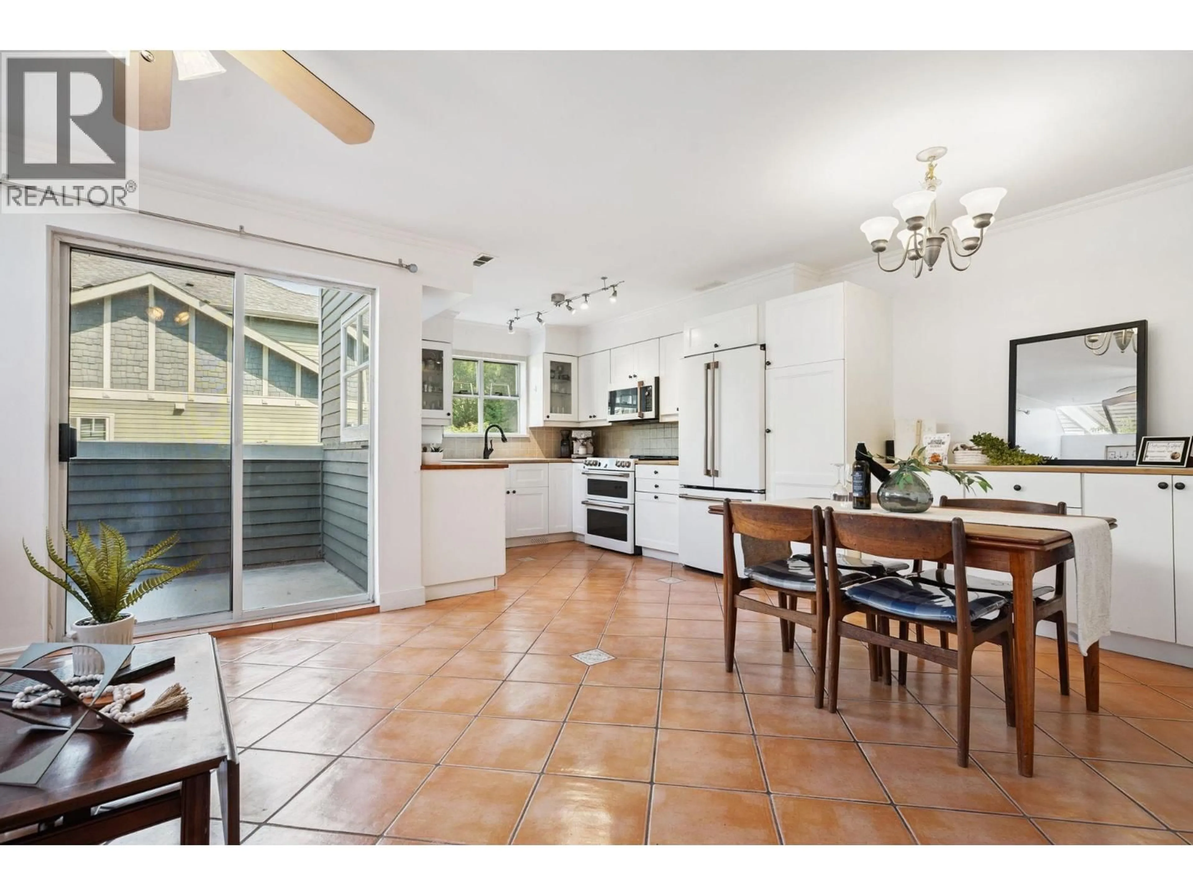 Open concept kitchen, ceramic/tile floor for 2 - 3347 DEWDNEY TRUNK ROAD, Port Moody British Columbia V3H2E4
