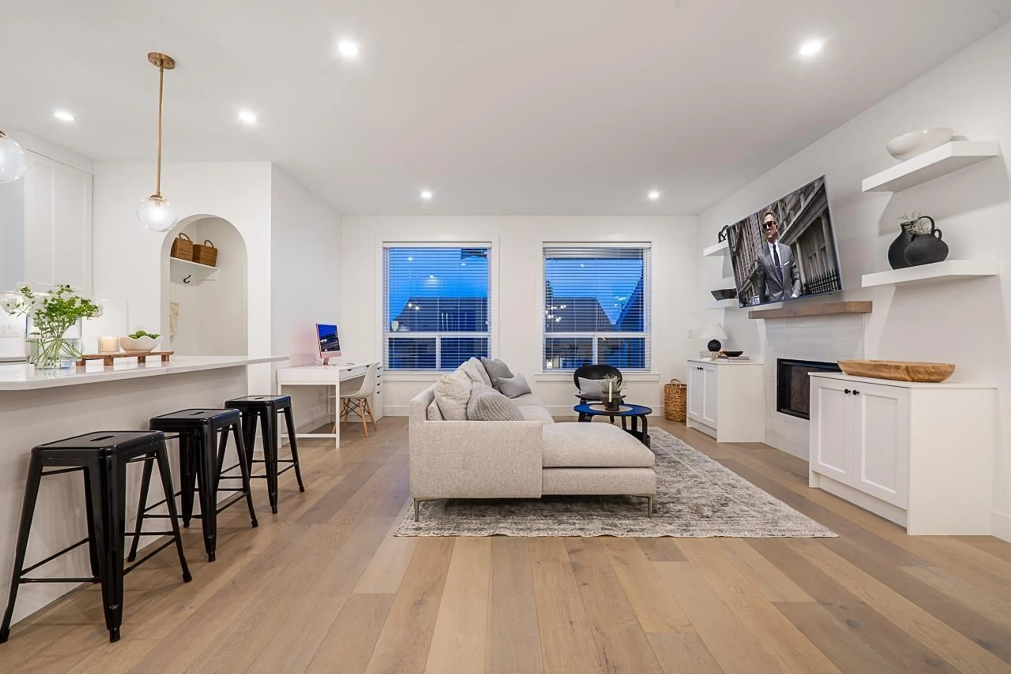 Living room with furniture, wood/laminate floor for 16792 21A, Surrey British Columbia V3Z0M3