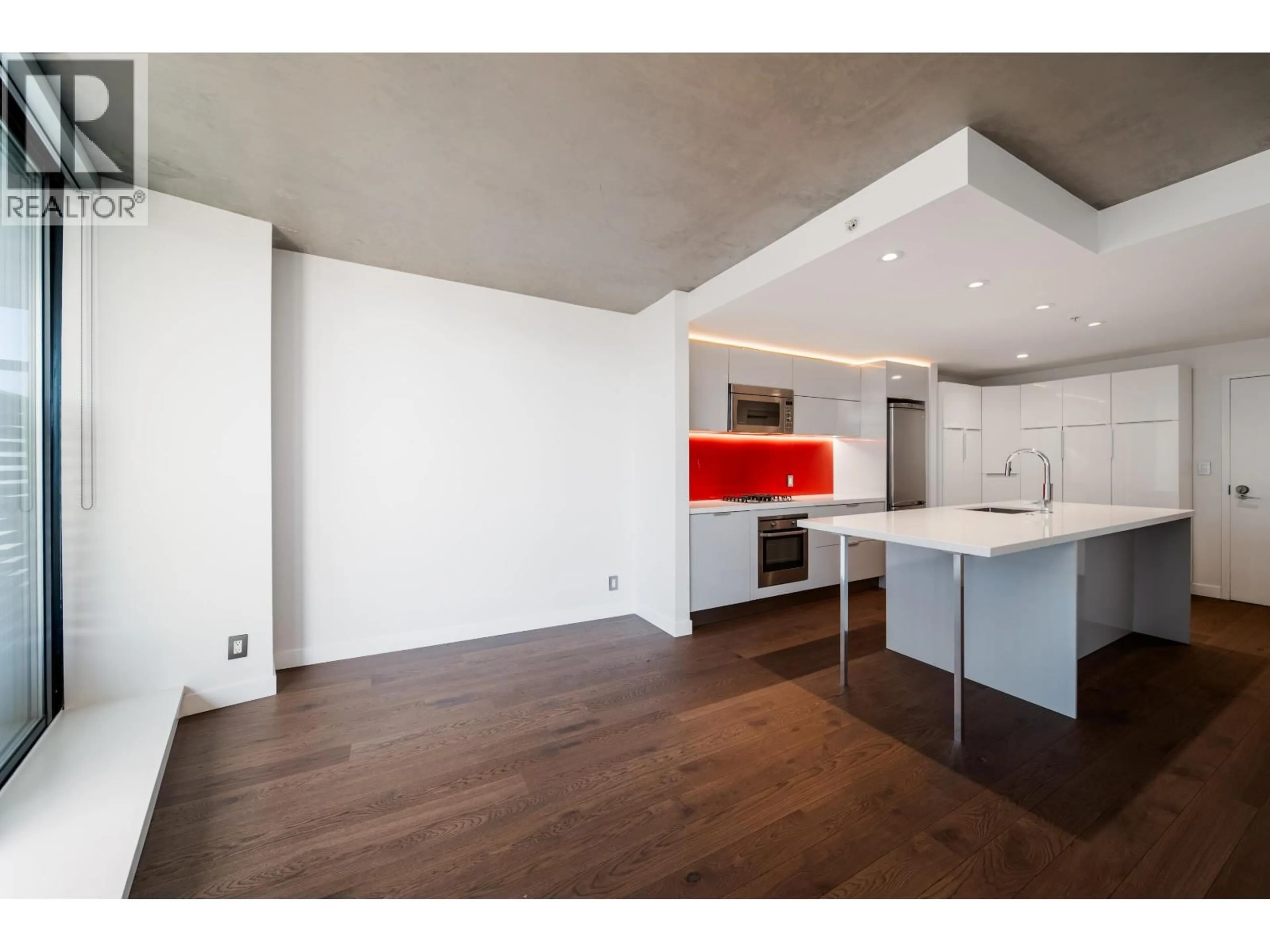 Open concept kitchen, wood/laminate floor for 2508 - 108 CORDOVA STREET, Vancouver British Columbia V6B0G5