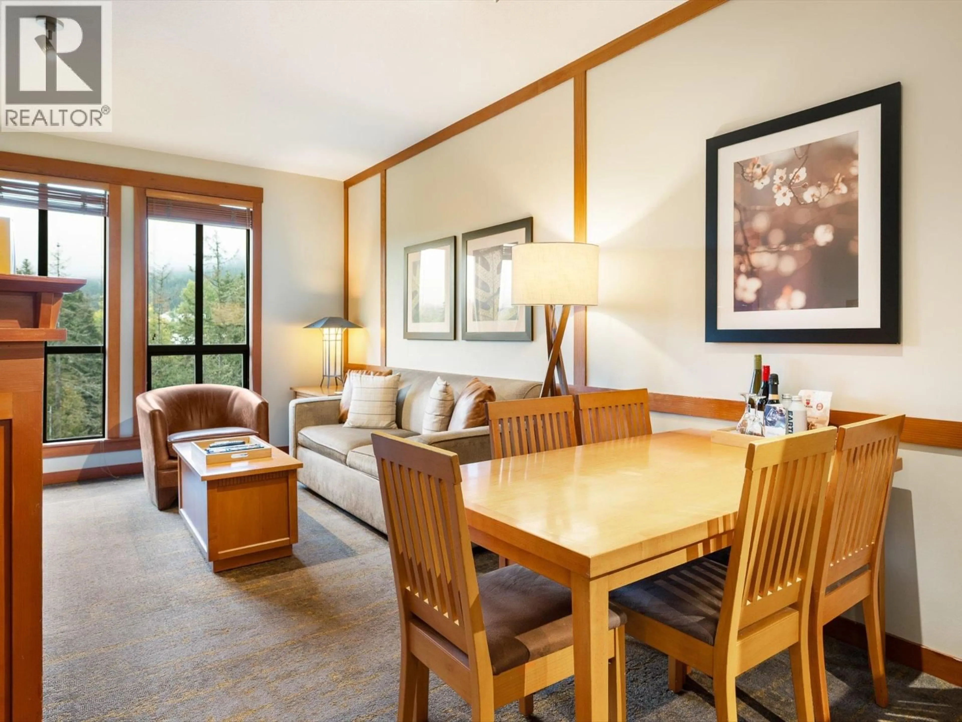 Living room with furniture, wood/laminate floor for 713 - 4320 SUNDIAL CRESCENT, Whistler British Columbia V8E1G6