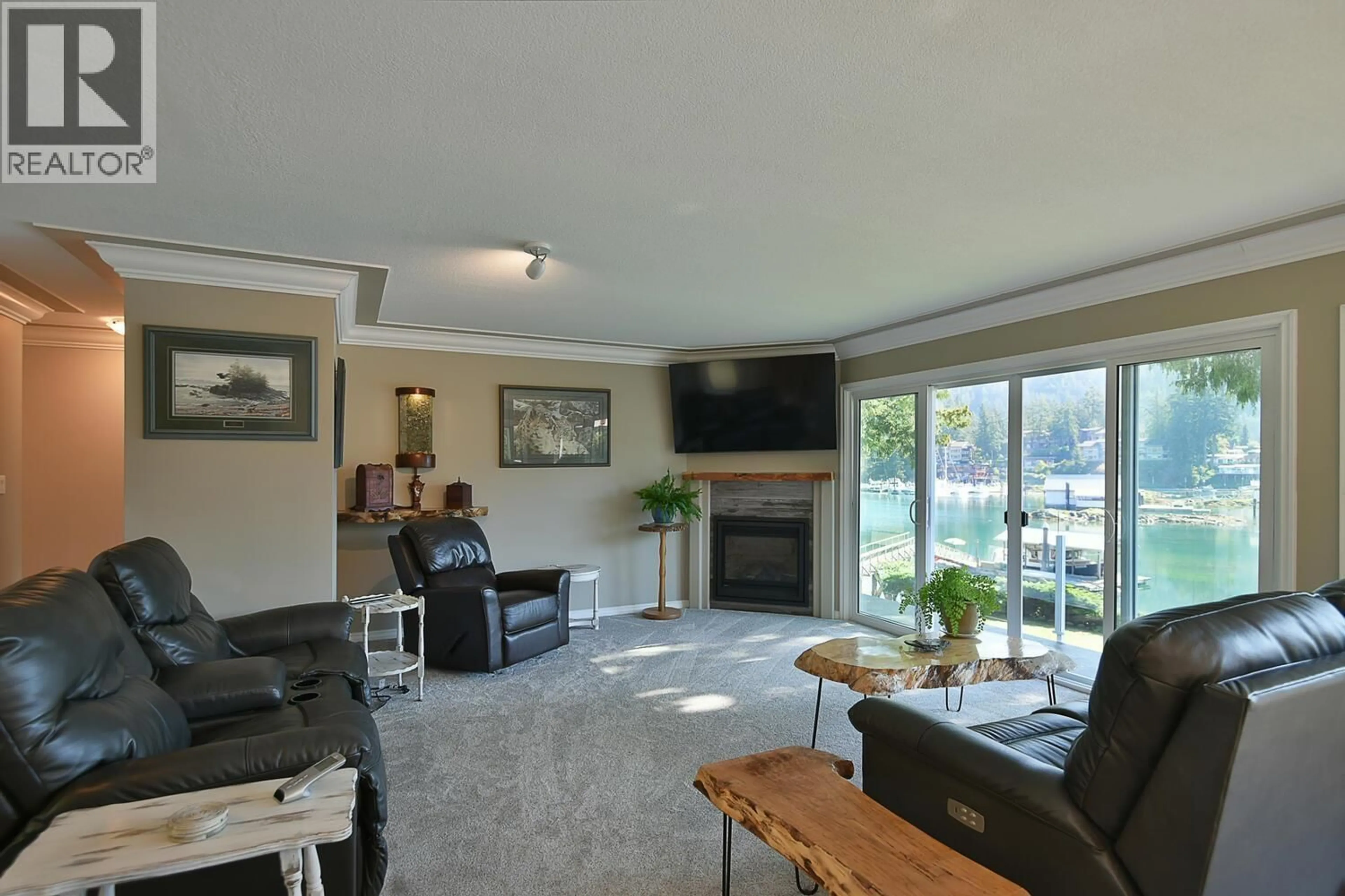 Living room with furniture, unknown for 12828 GILDEN ROAD, Madeira Park British Columbia V0N2H1