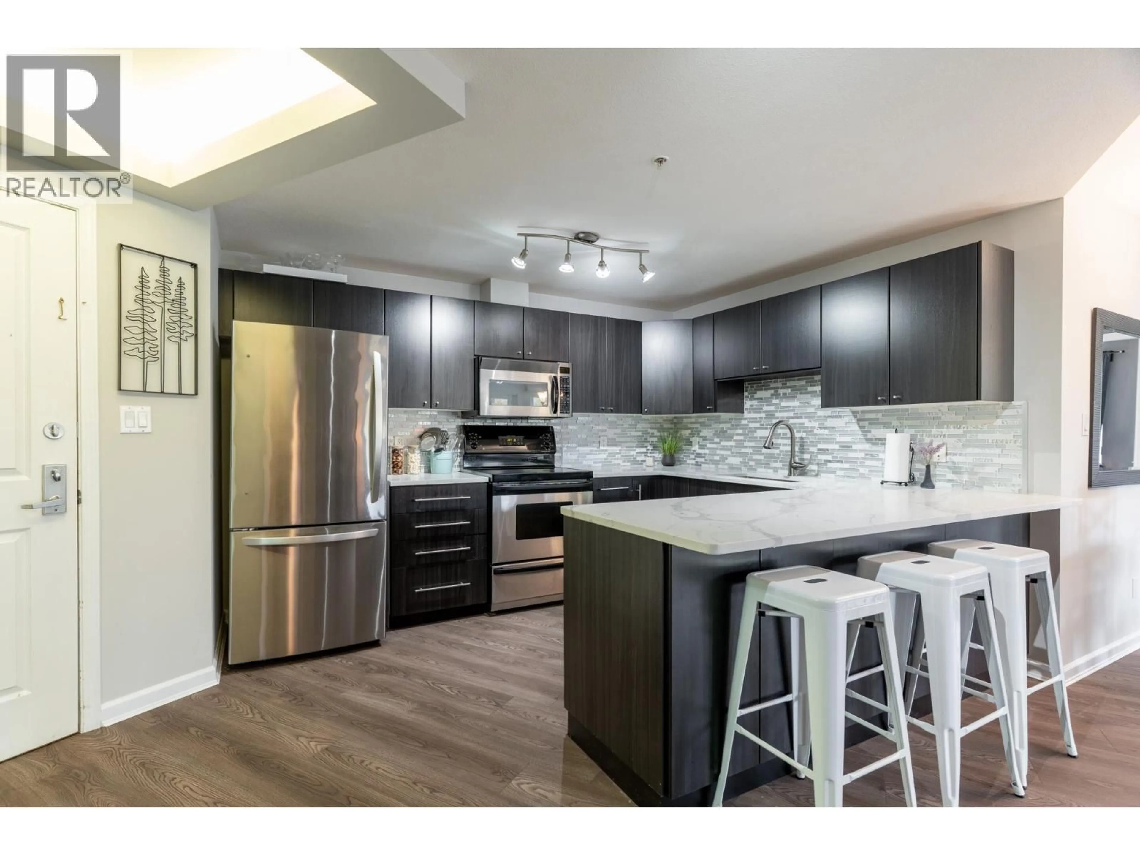 Open concept kitchen, wood/laminate floor for A306 - 2099 LOUGHEED HIGHWAY, Port Coquitlam British Columbia V3B1A8