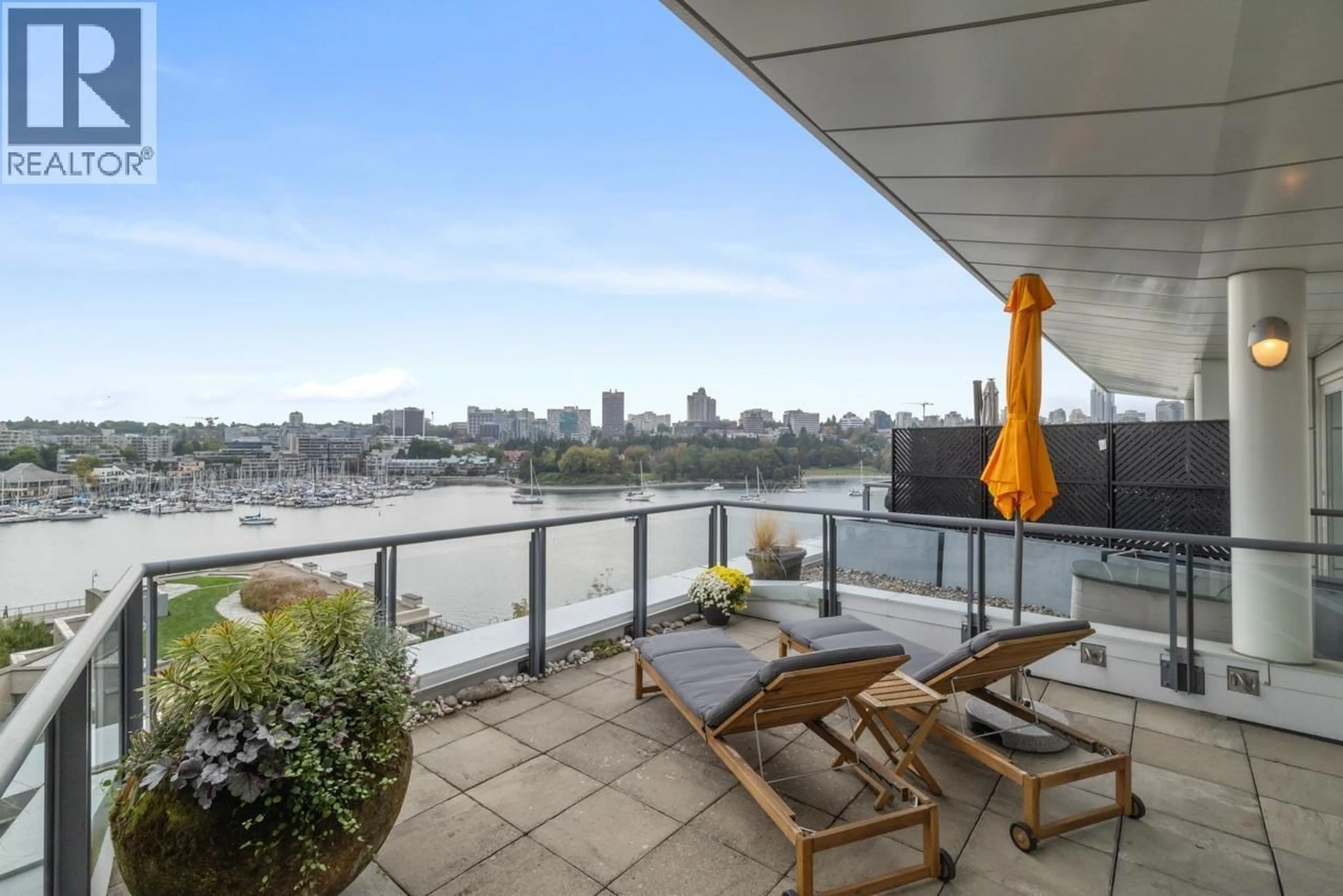 Patio, city buildings view from balcony for 805 - 1383 MARINASIDE CRESCENT, Vancouver British Columbia V6Z2W9