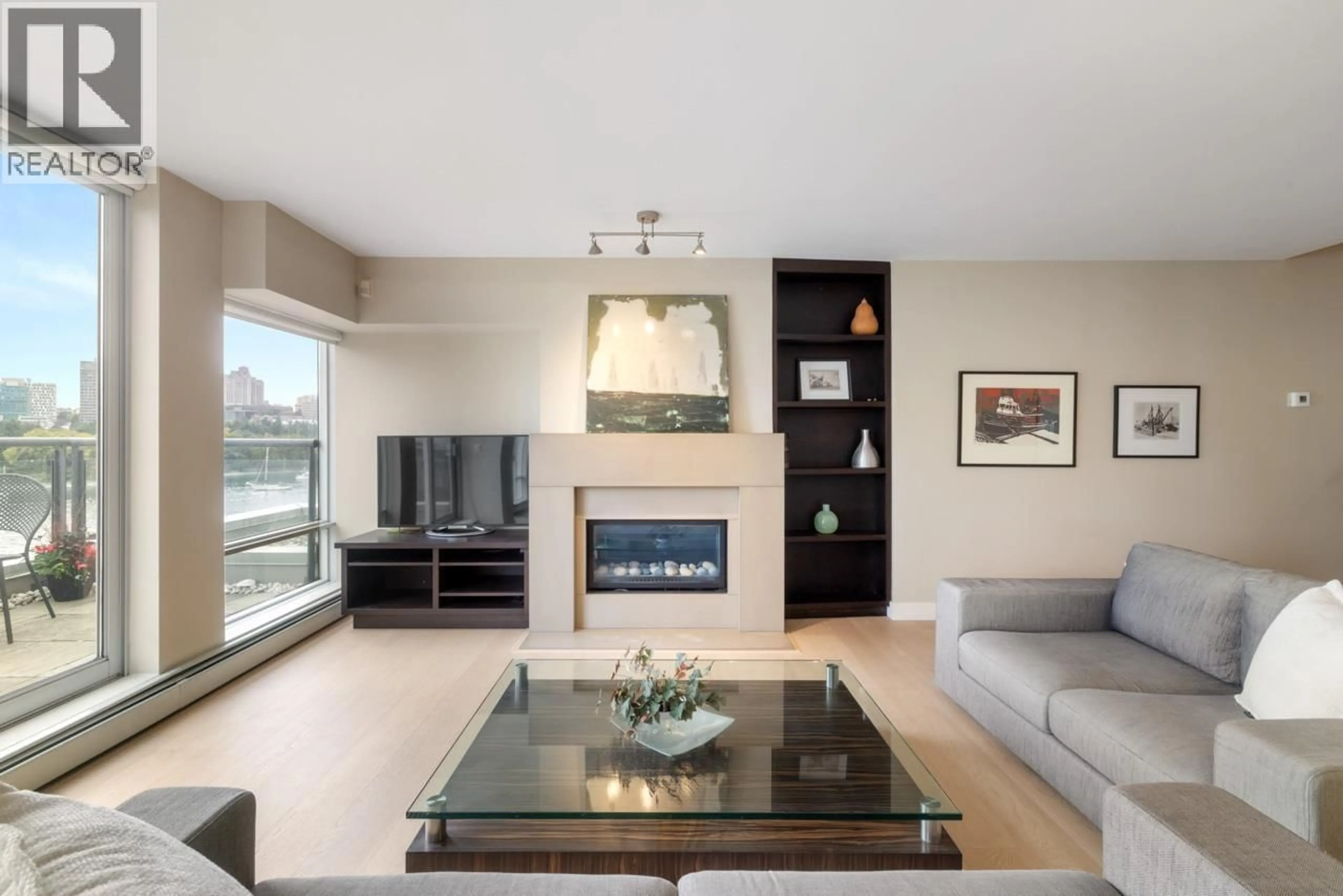 Living room with furniture, unknown for 805 - 1383 MARINASIDE CRESCENT, Vancouver British Columbia V6Z2W9