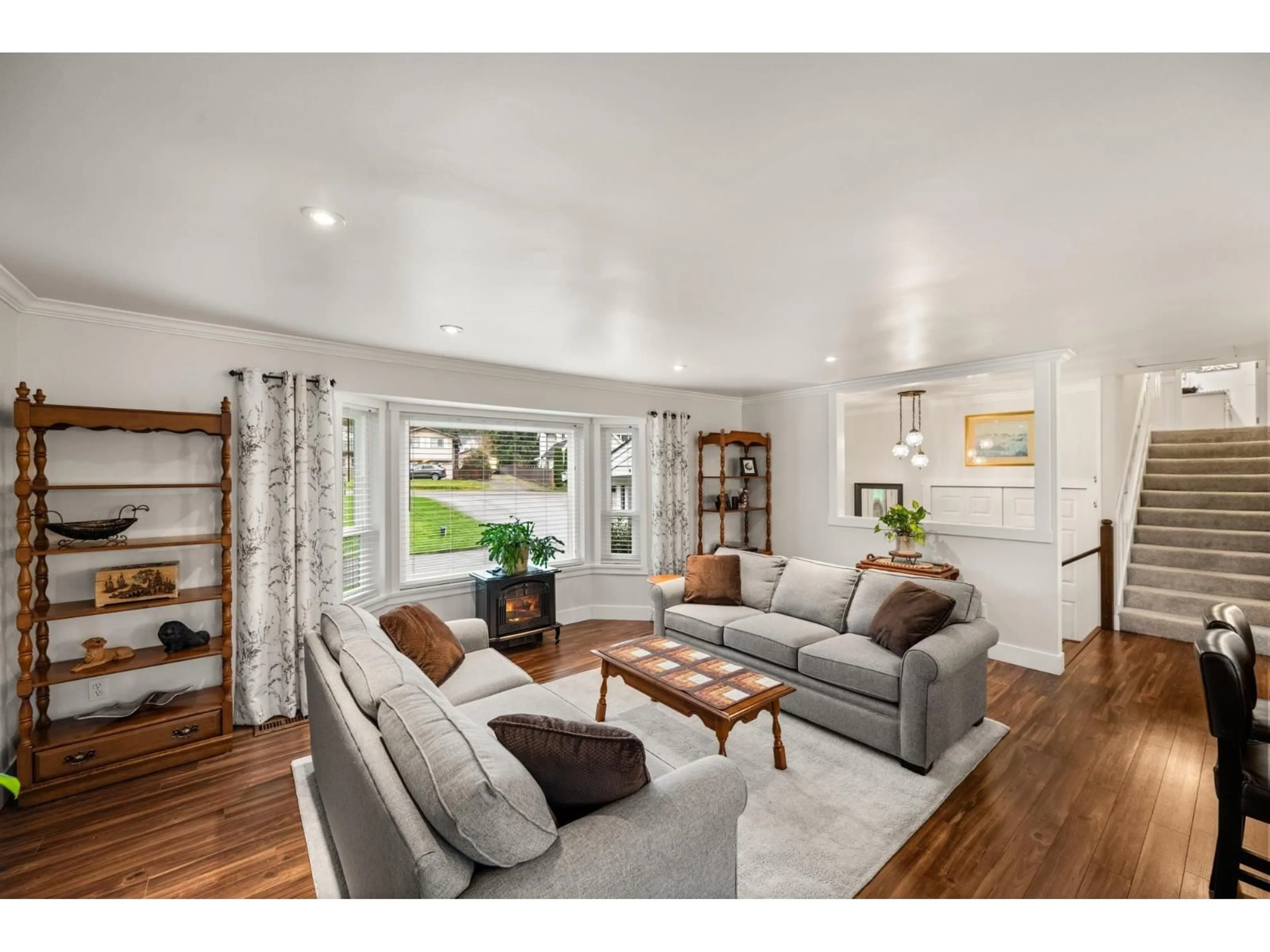 Living room with furniture, wood/laminate floor for 23731 OLD YALE, Langley British Columbia V2Z2K4