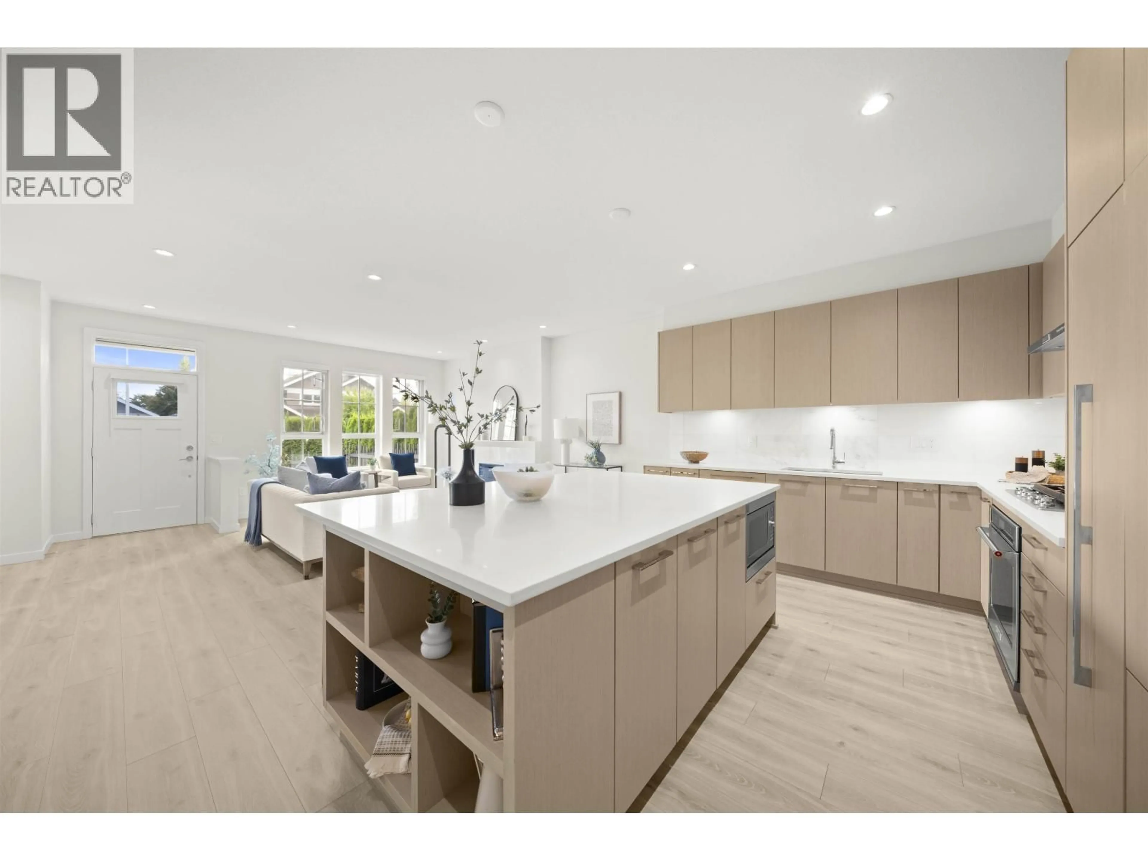 Open concept kitchen, ceramic/tile floor for 122 - 5311 ADMIRAL WAY, Delta British Columbia V4K0E2