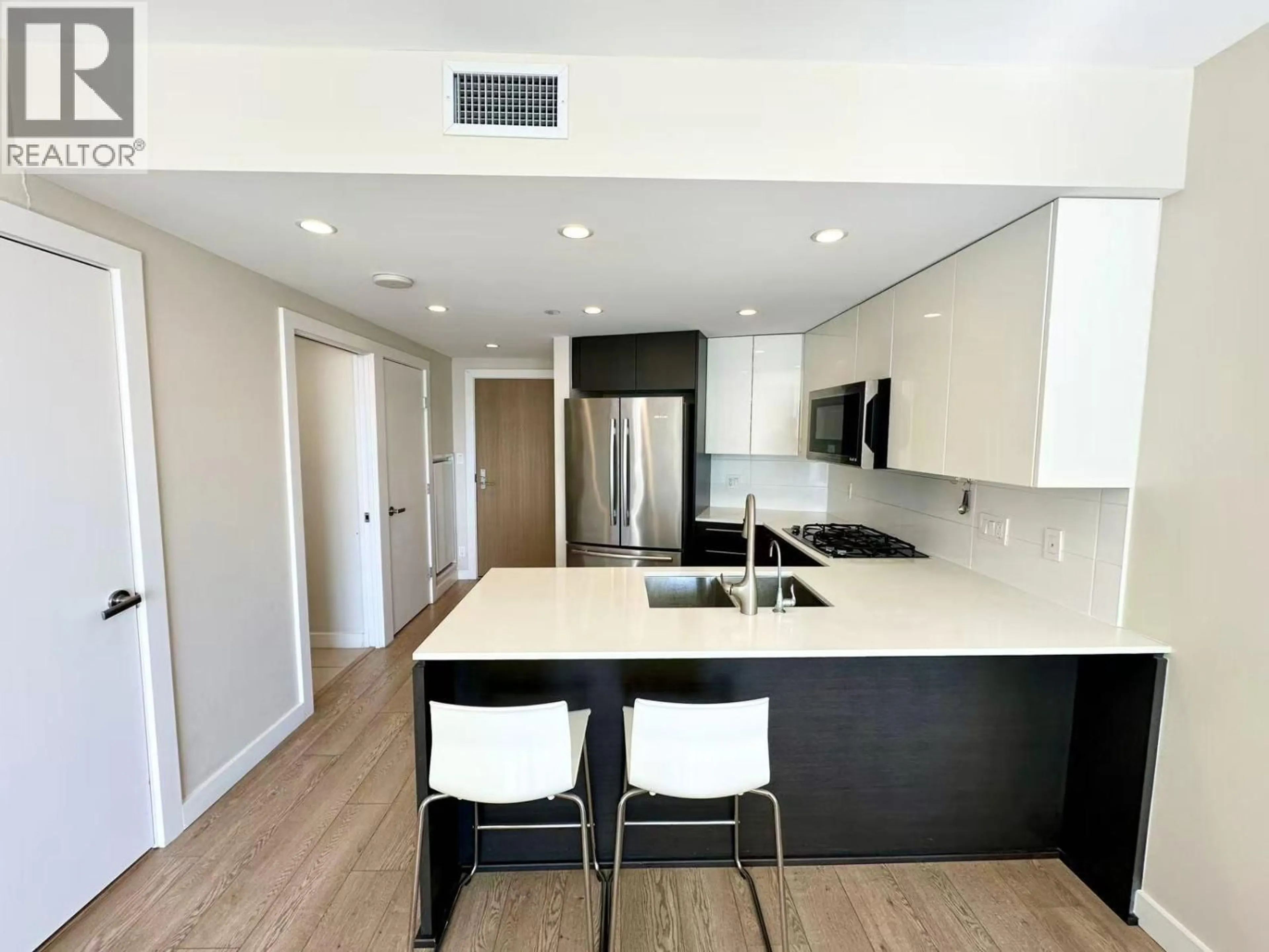 Open concept kitchen, wood/laminate floor for 1701 - 1618 QUEBEC STREET, Vancouver British Columbia V6A0C5