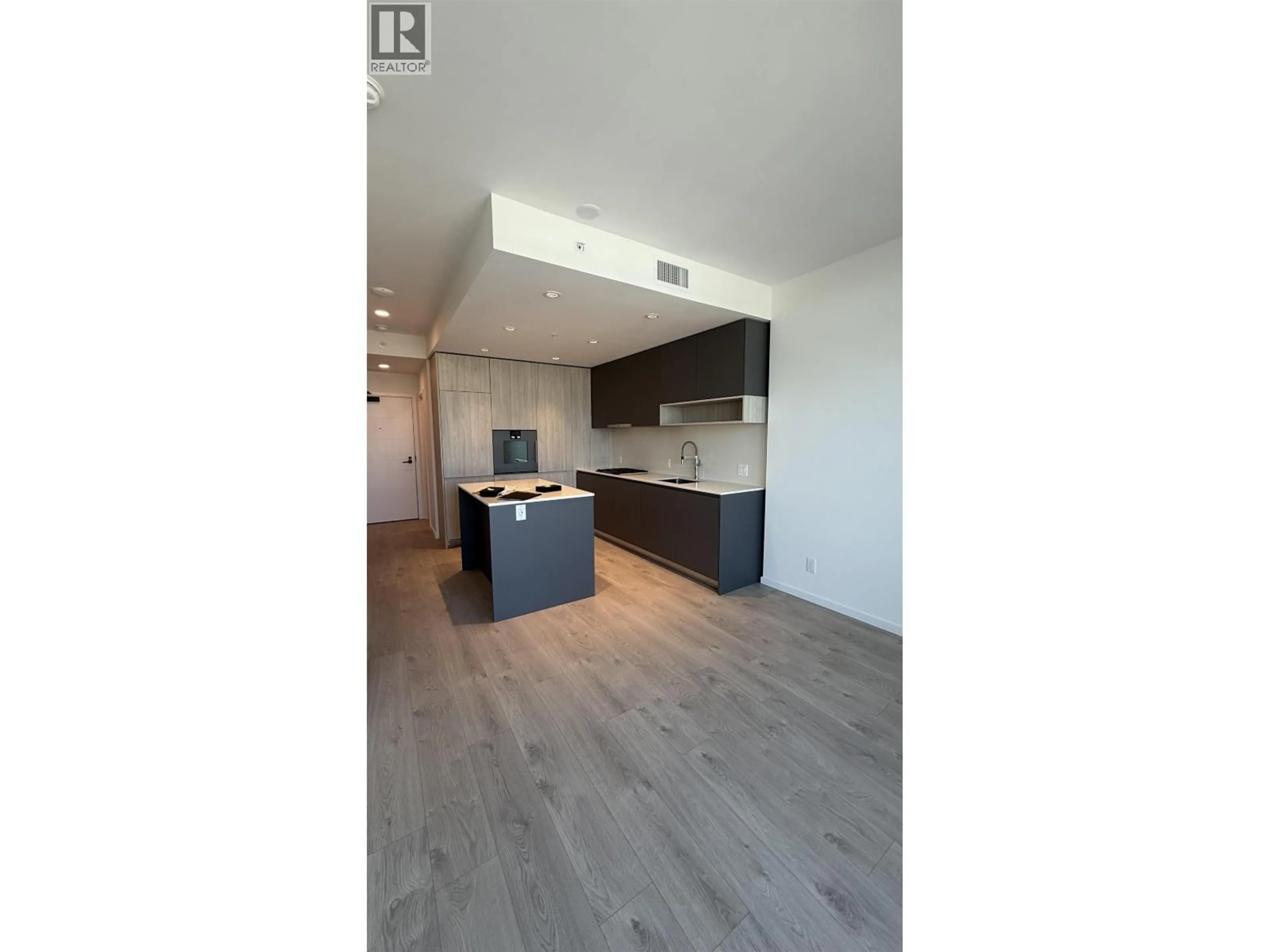 Open concept kitchen, wood/laminate floor for 859 - 6600 MINORU BOULEVARD, Richmond British Columbia V6Y0N3
