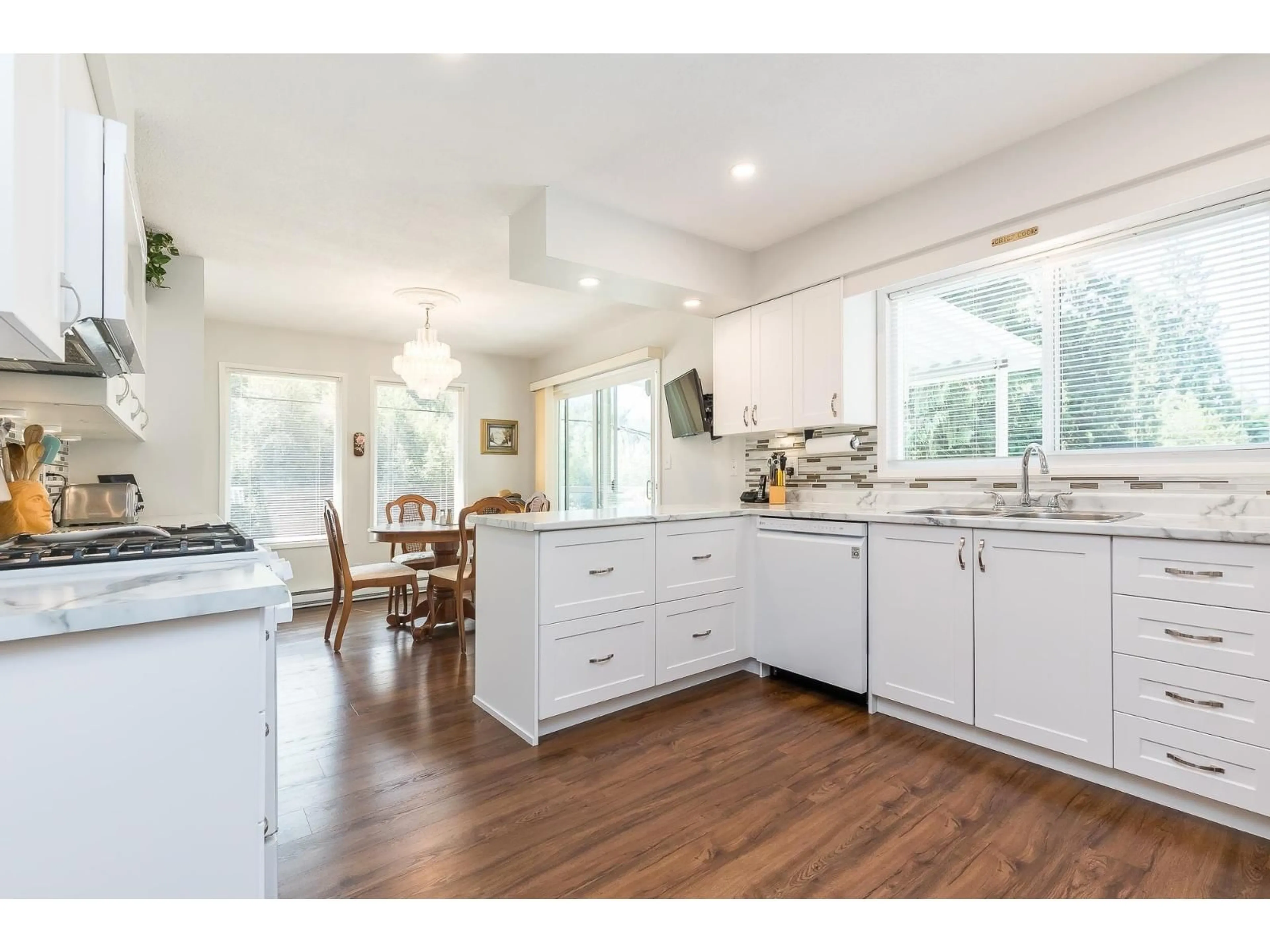 Open concept kitchen, wood/laminate floor for 50871 O'BYRNE ROAD, Chilliwack British Columbia V4Z1B6