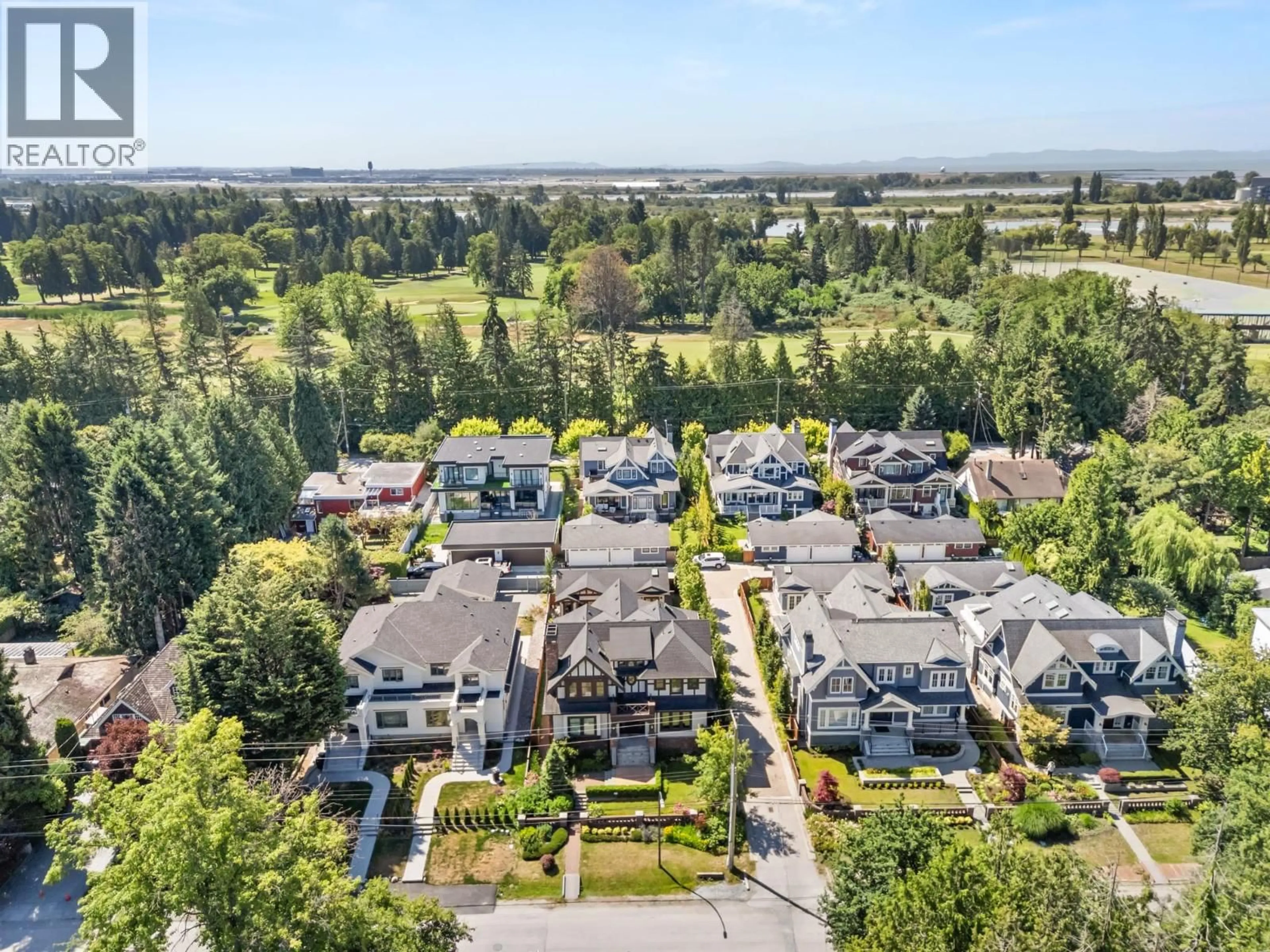 A pic from outside/outdoor area/front of a property/back of a property/a pic from drone, mountain view for 3838 50TH AVENUE, Vancouver British Columbia V6N3V5