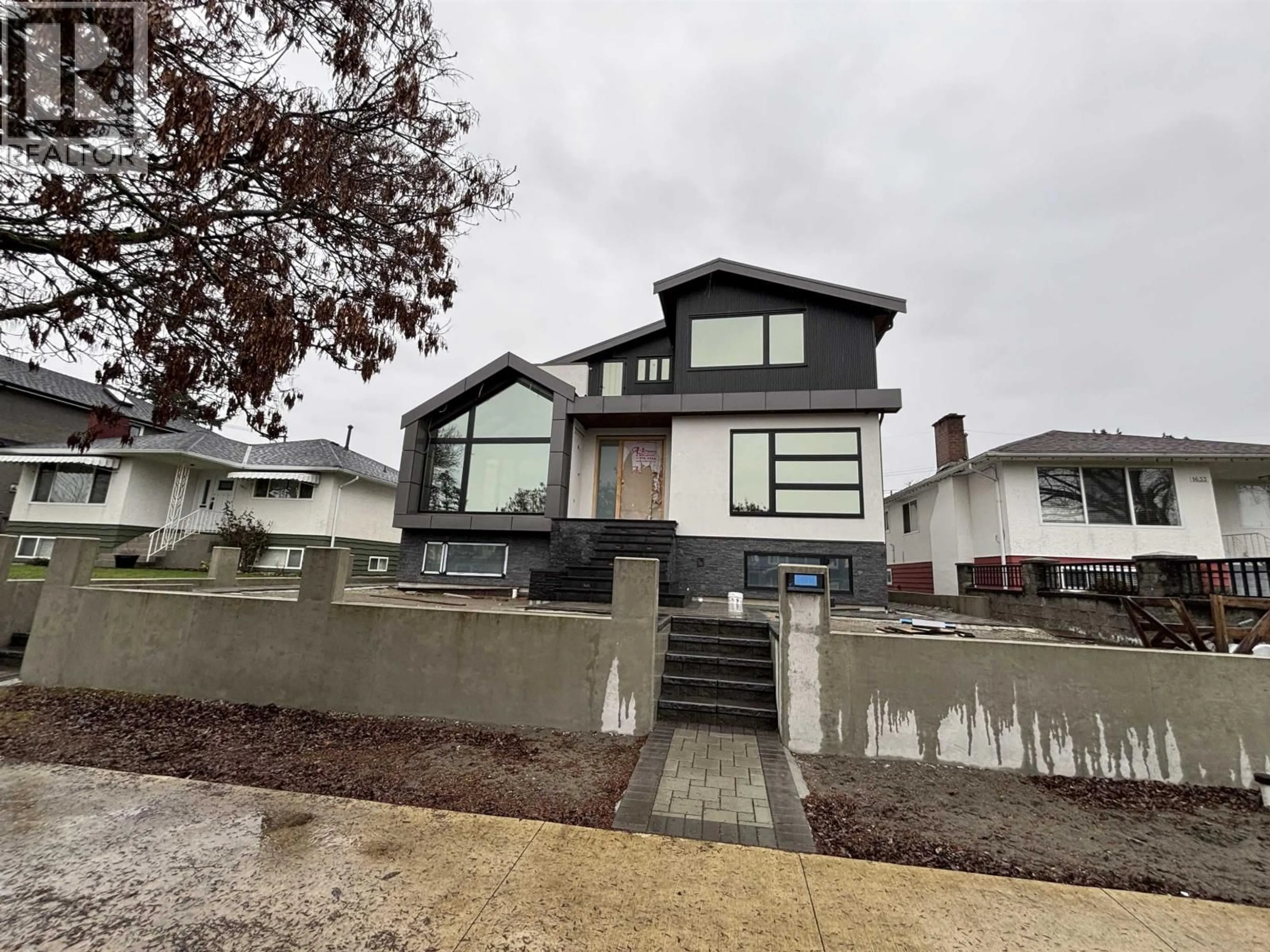 Home with vinyl exterior material, street for 1629 59TH AVENUE, Vancouver British Columbia V5P2G8