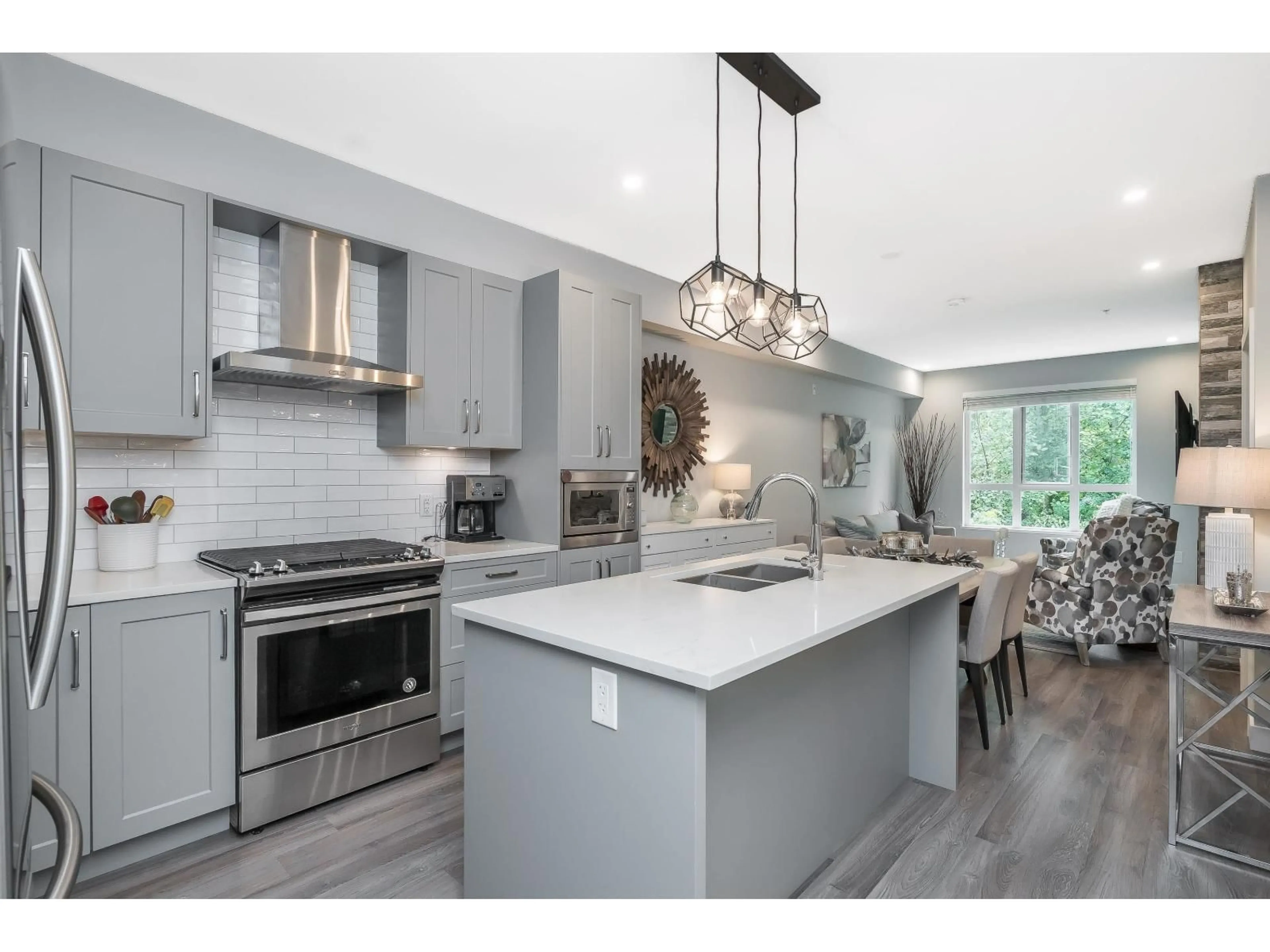 Open concept kitchen, unknown for 320 - 15436 31, Surrey British Columbia V3Z1H3