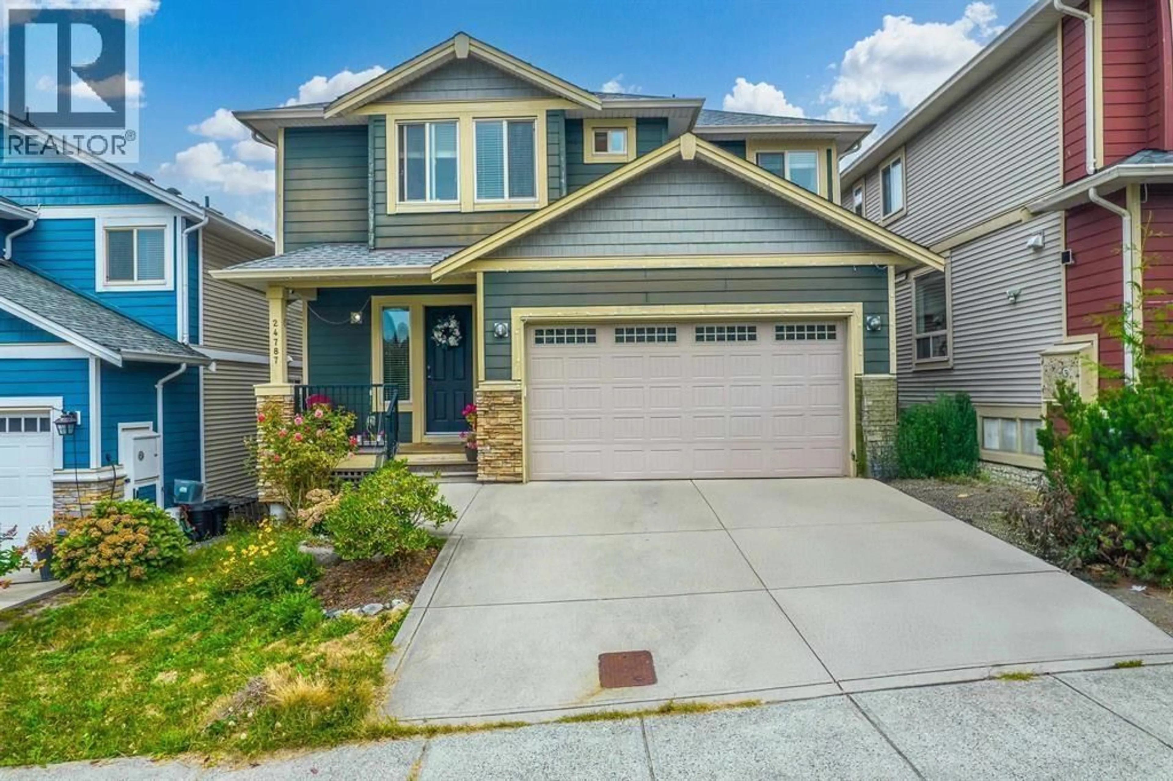 Home with vinyl exterior material, street for 24787 105A AVENUE, Maple Ridge British Columbia V2W0G2
