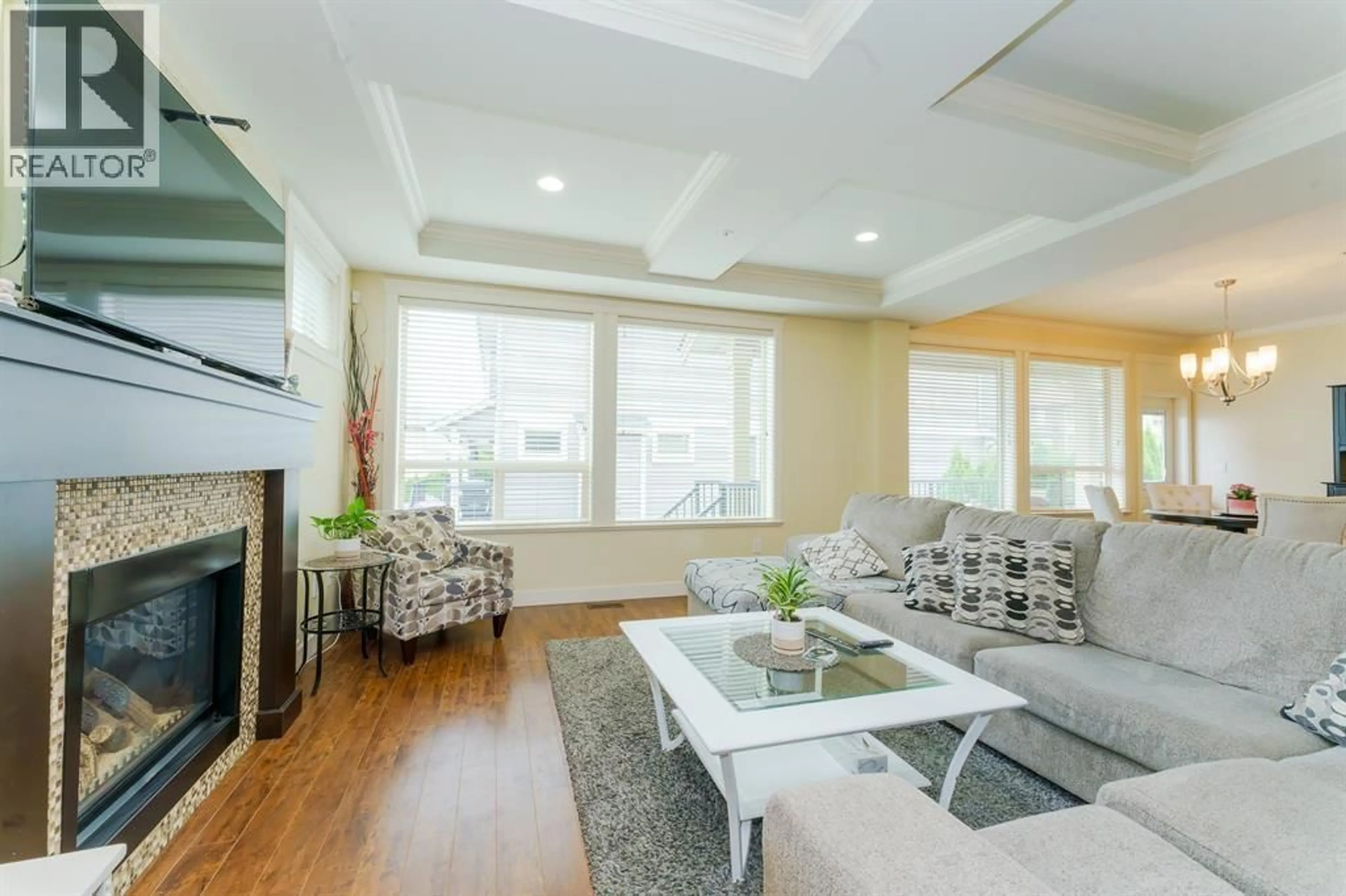 Living room with furniture, wood/laminate floor for 24787 105A AVENUE, Maple Ridge British Columbia V2W0G2