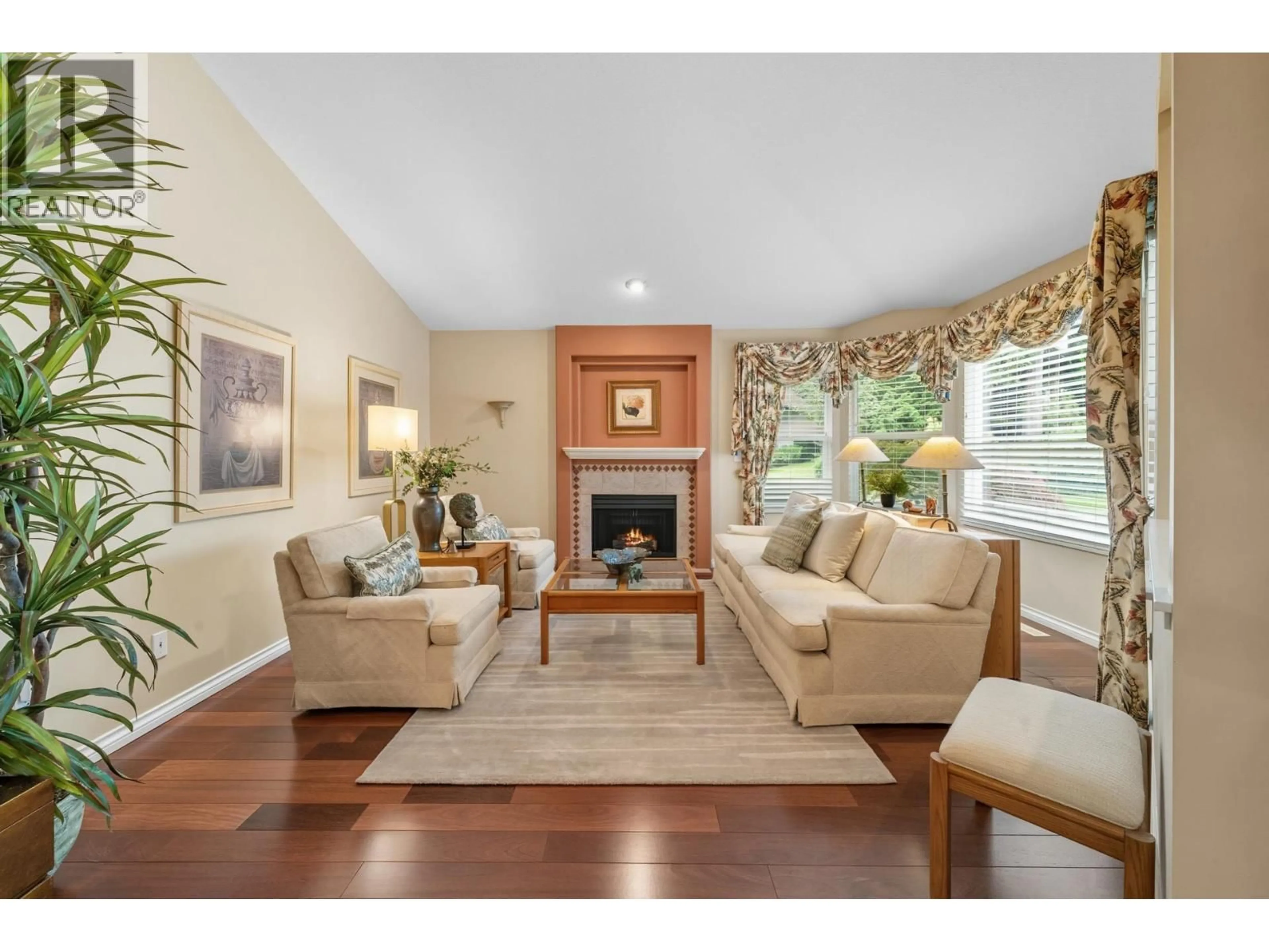 Living room with furniture, wood/laminate floor for 165 - 101 PARKSIDE DRIVE, Port Moody British Columbia V3H4W6