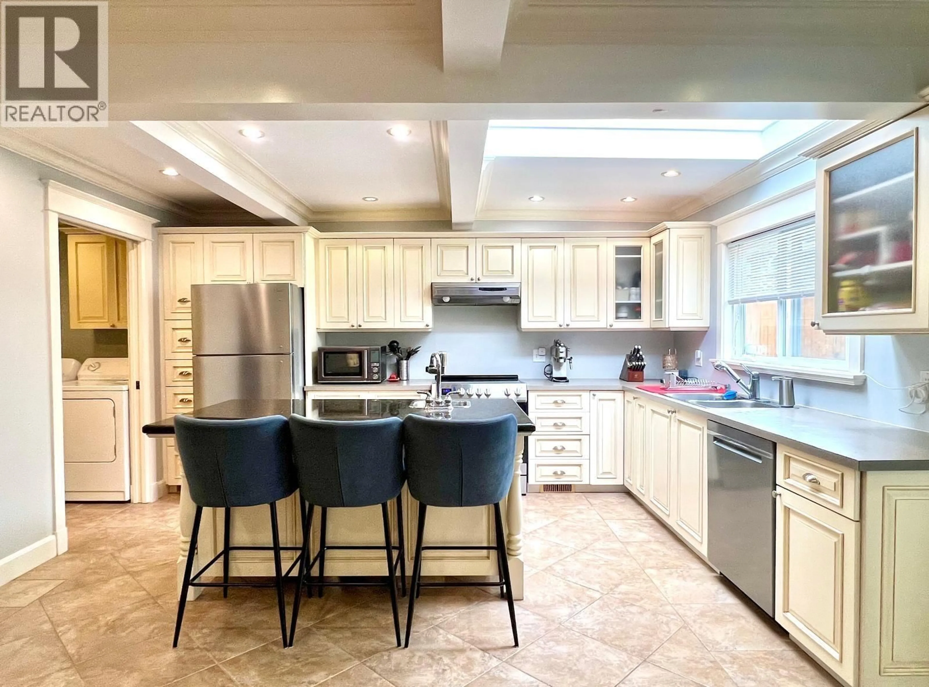 Open concept kitchen, ceramic/tile floor for 7688 BURGESS STREET, Burnaby British Columbia V3N3J2