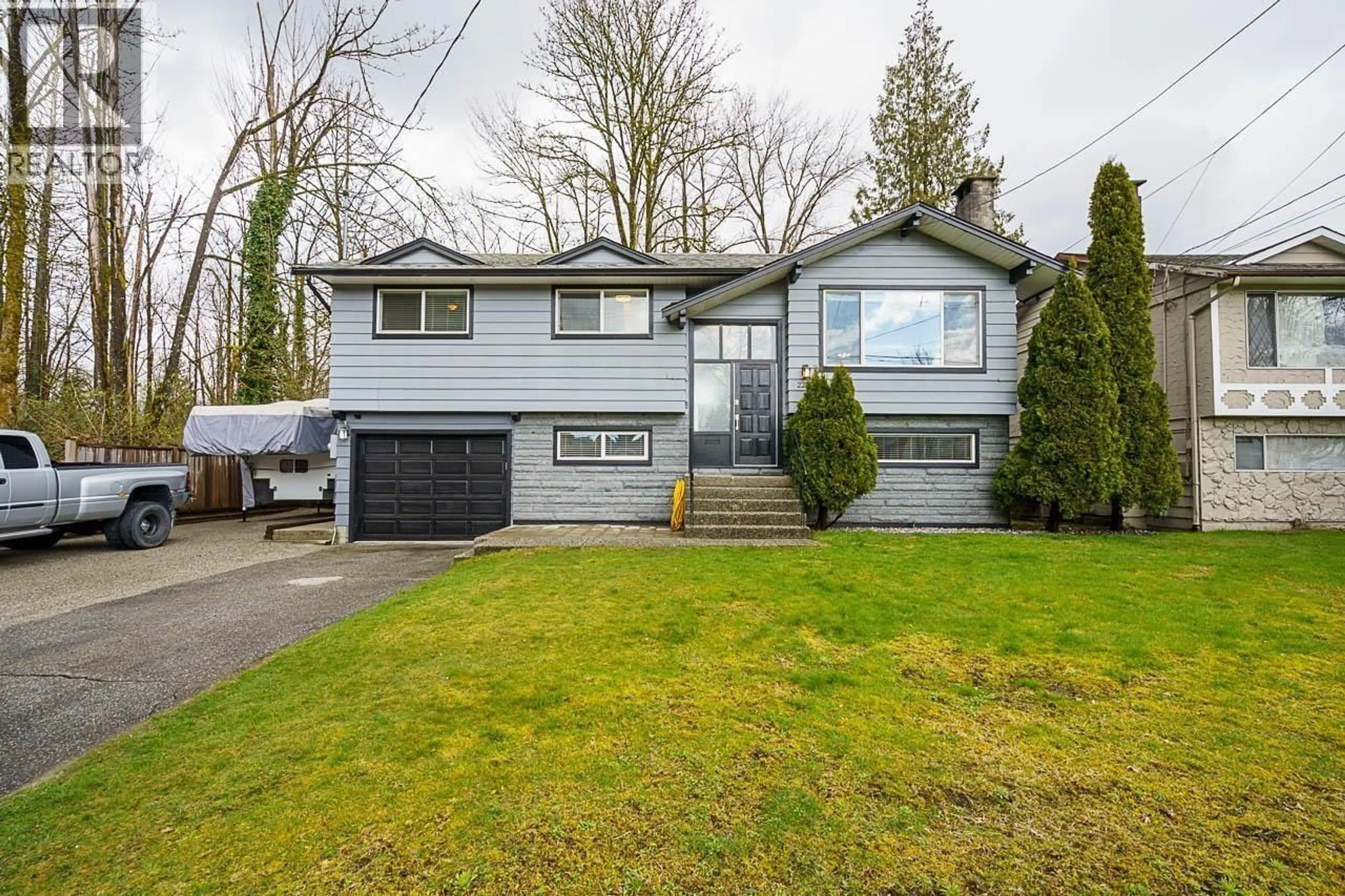 Home with vinyl exterior material, street for 2259 PRAIRIE AVENUE, Port Coquitlam British Columbia V3B1V8