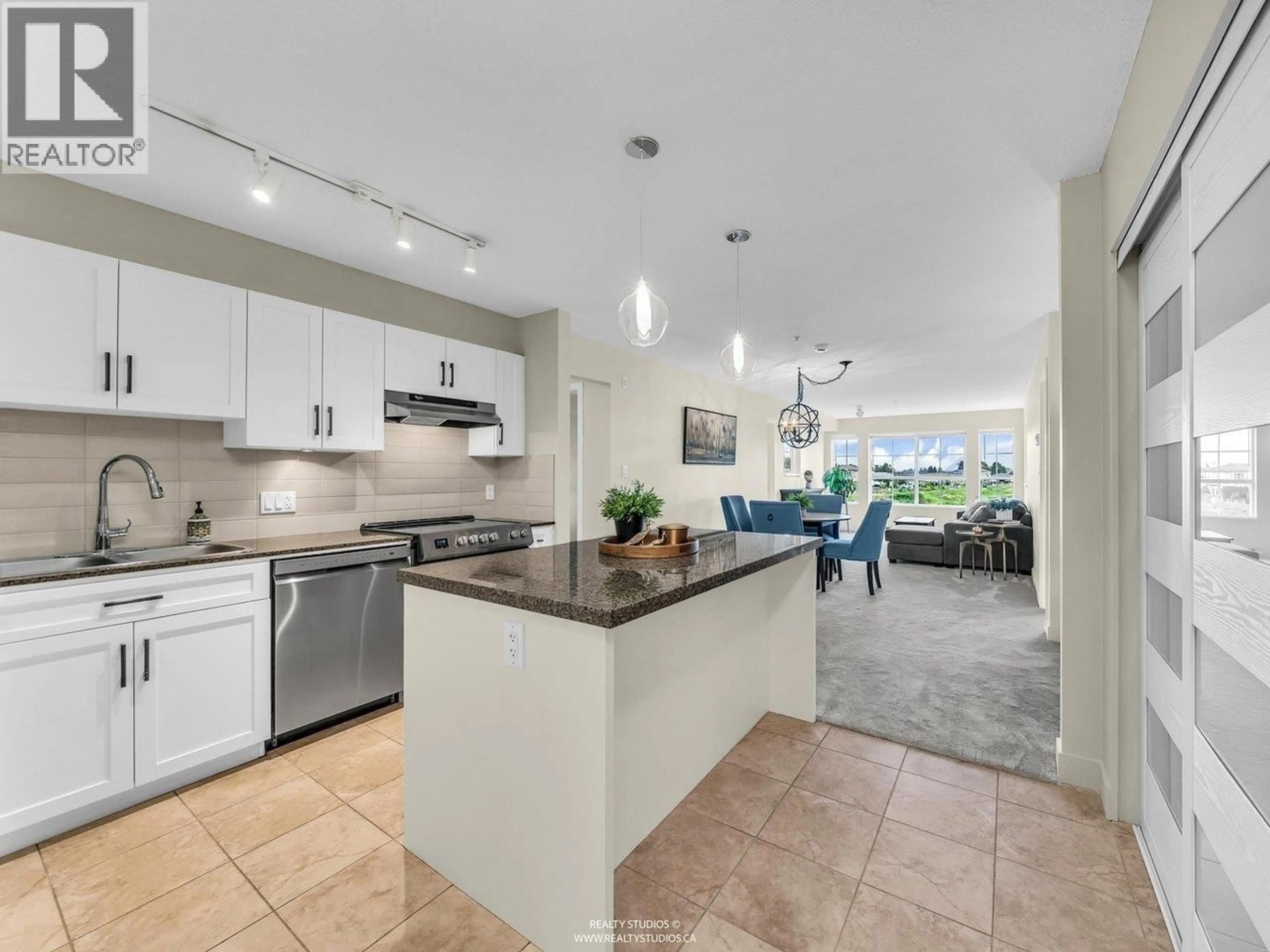 Open concept kitchen, ceramic/tile floor for 225 - 19673 MEADOW GARDENS WAY, Pitt Meadows British Columbia V3Y0A1