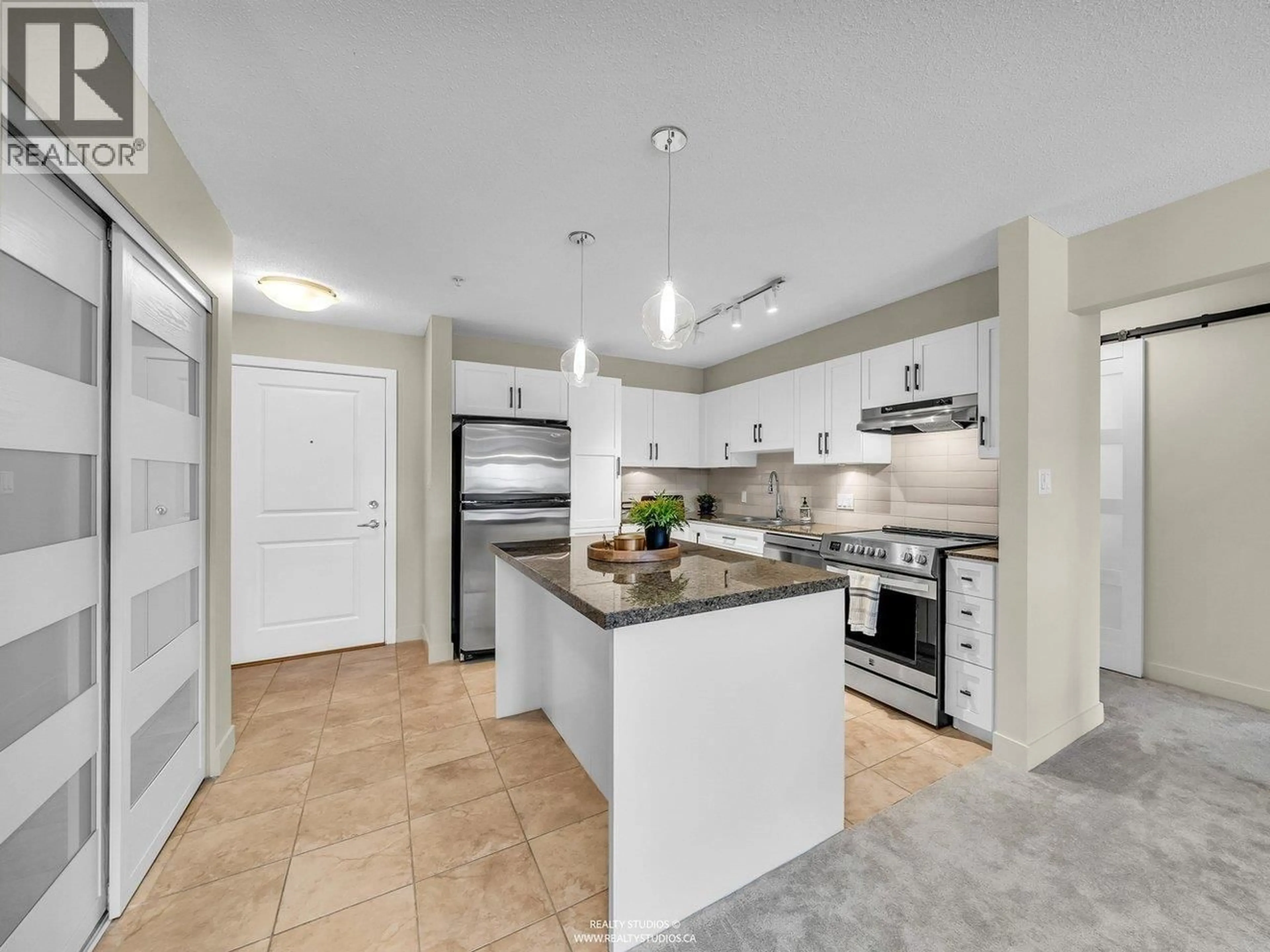 Open concept kitchen, ceramic/tile floor for 225 - 19673 MEADOW GARDENS WAY, Pitt Meadows British Columbia V3Y0A1