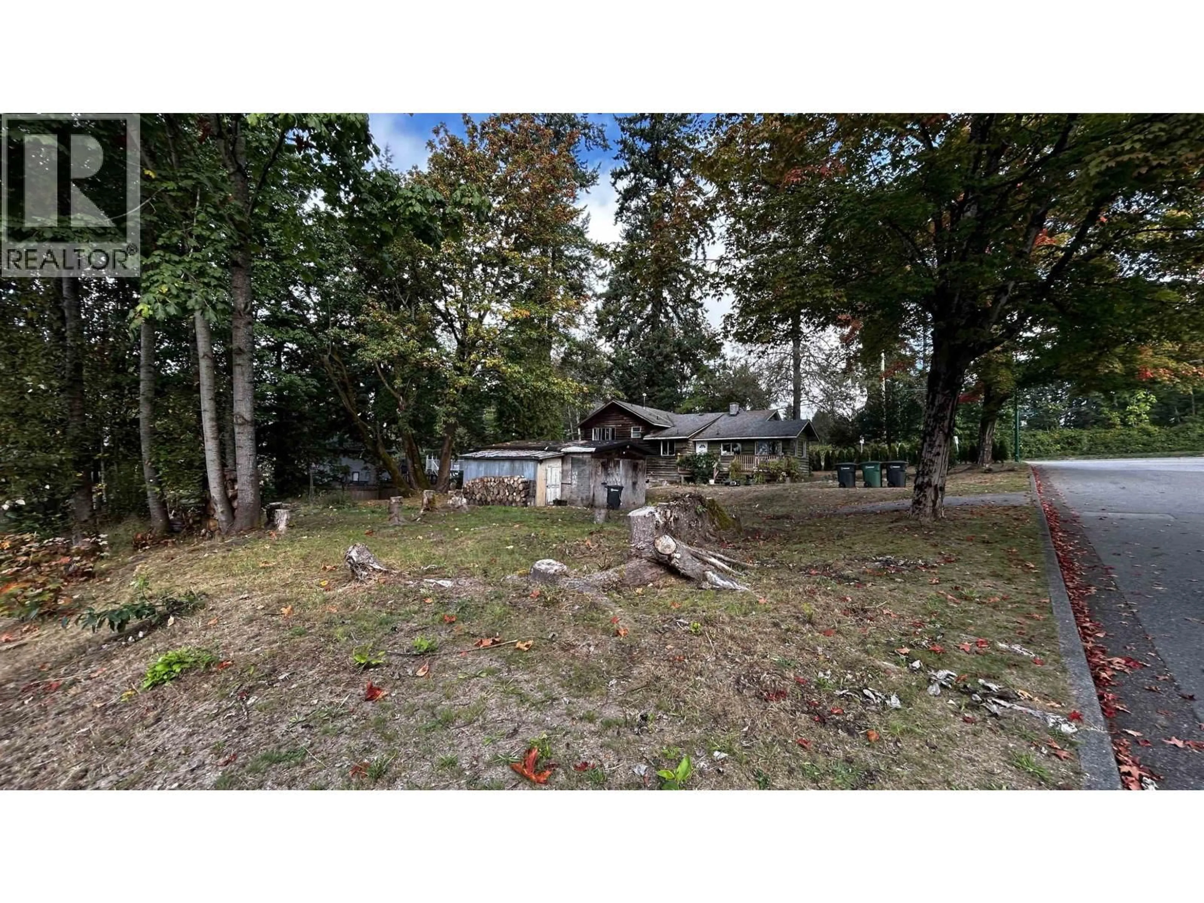 A pic from outside/outdoor area/front of a property/back of a property/a pic from drone, forest/trees view for 7492 BROADWAY, Burnaby British Columbia V5A1S4