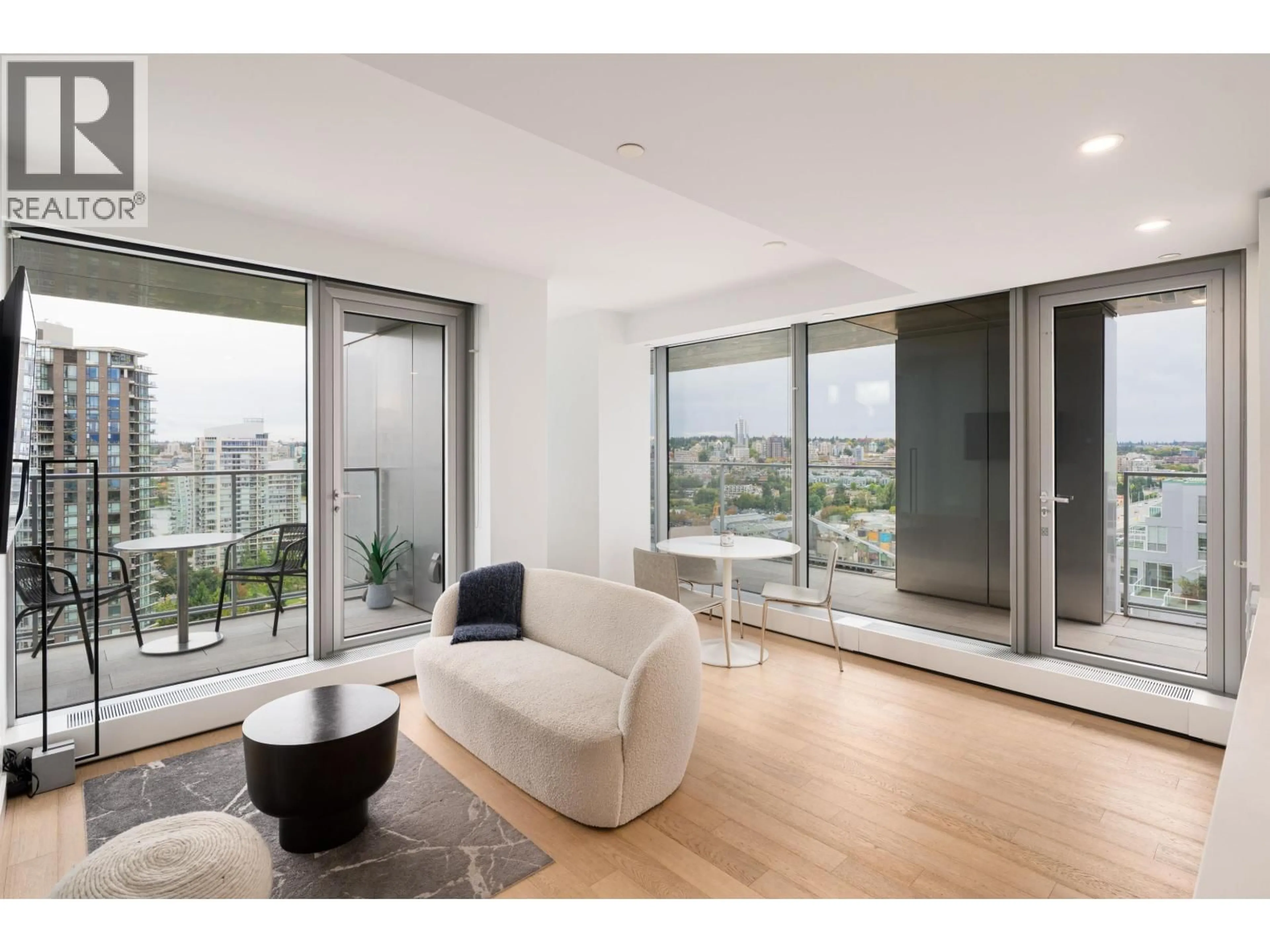 Living room with furniture, wood/laminate floor for 2602 - 1480 HOWE STREET, Vancouver British Columbia V6Z0G5