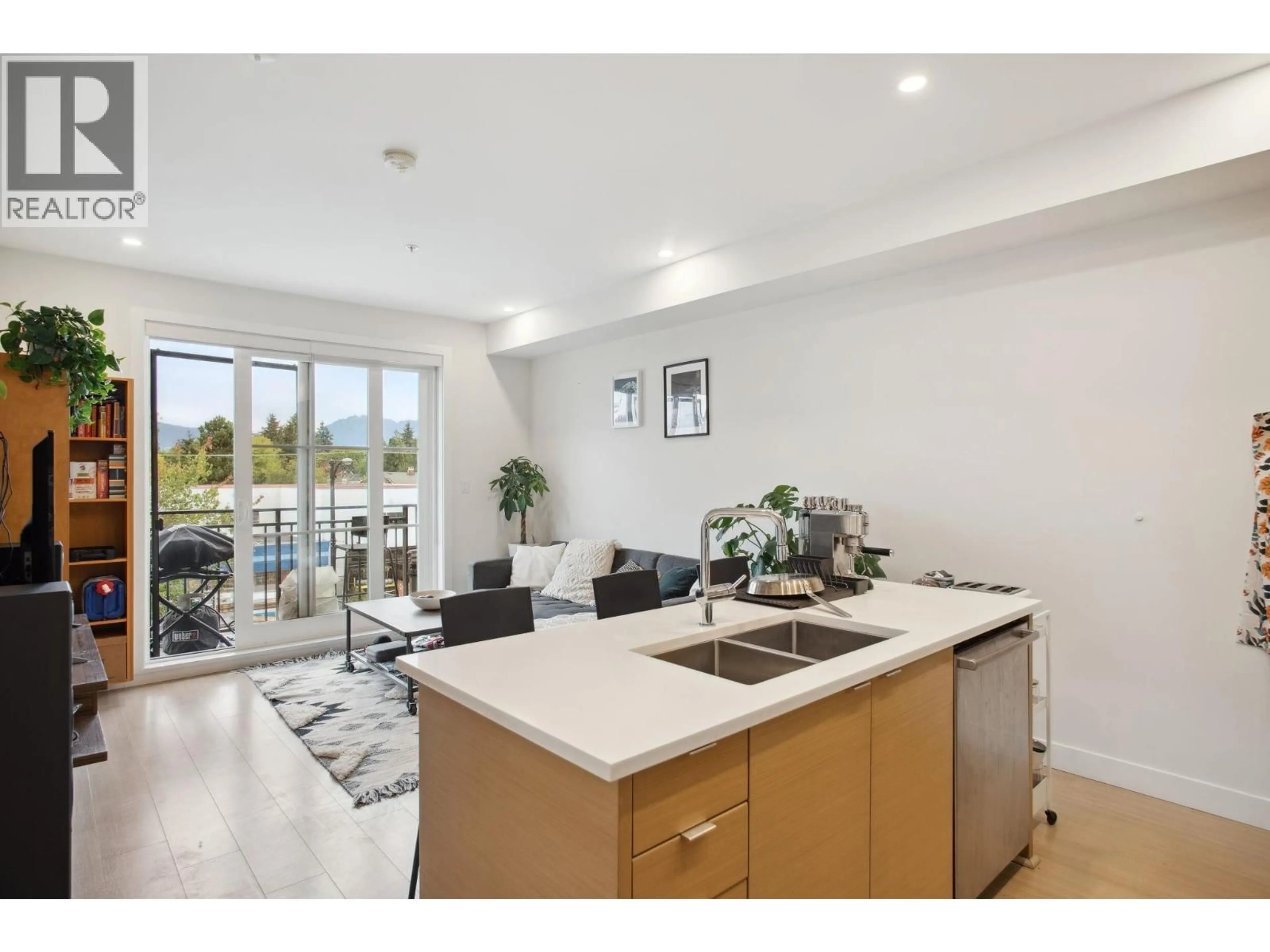 Open concept kitchen, unknown for 309 - 2528 COLLINGWOOD STREET, Vancouver British Columbia V6R0C1