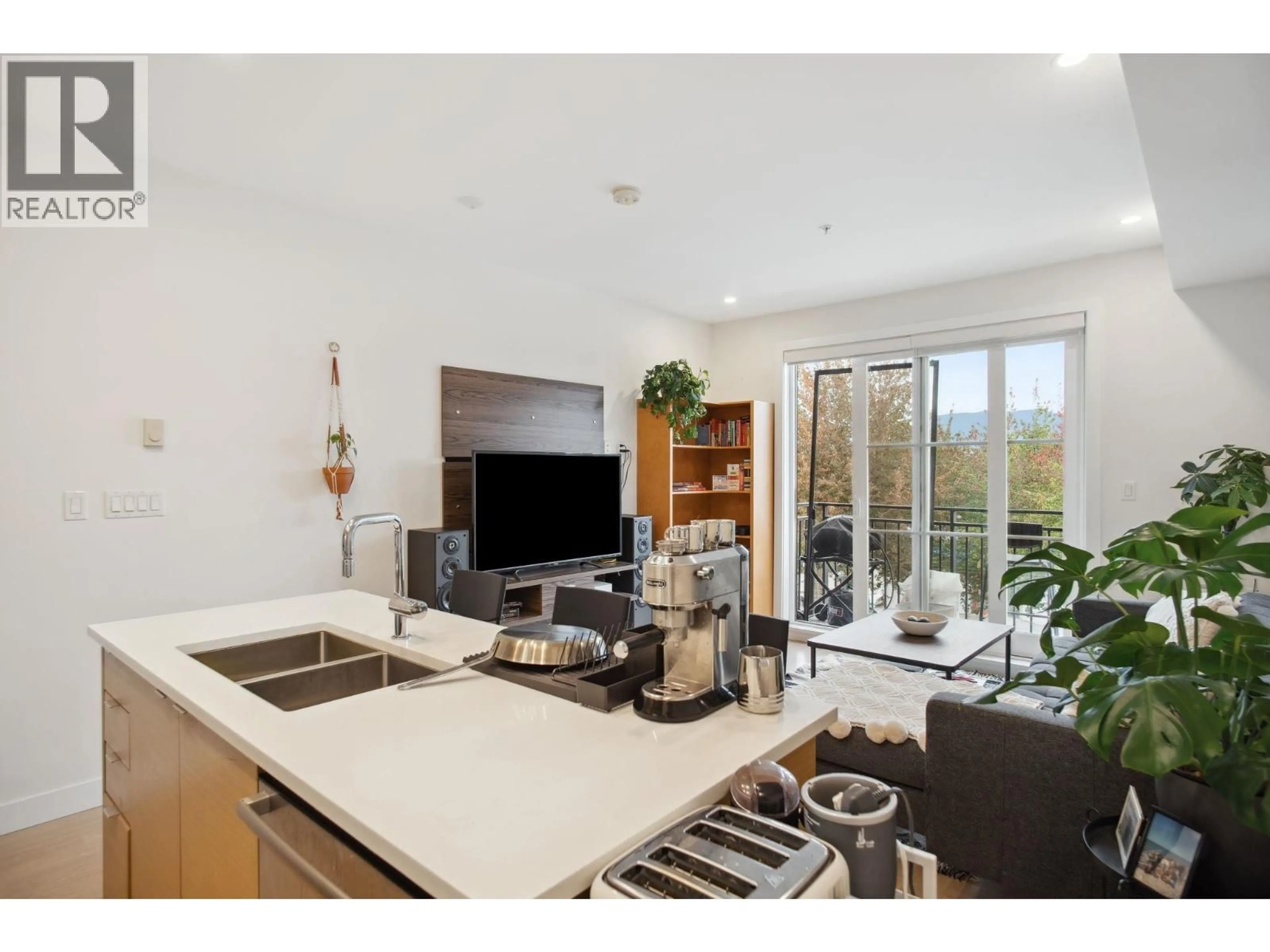 Open concept kitchen, unknown for 309 - 2528 COLLINGWOOD STREET, Vancouver British Columbia V6R0C1
