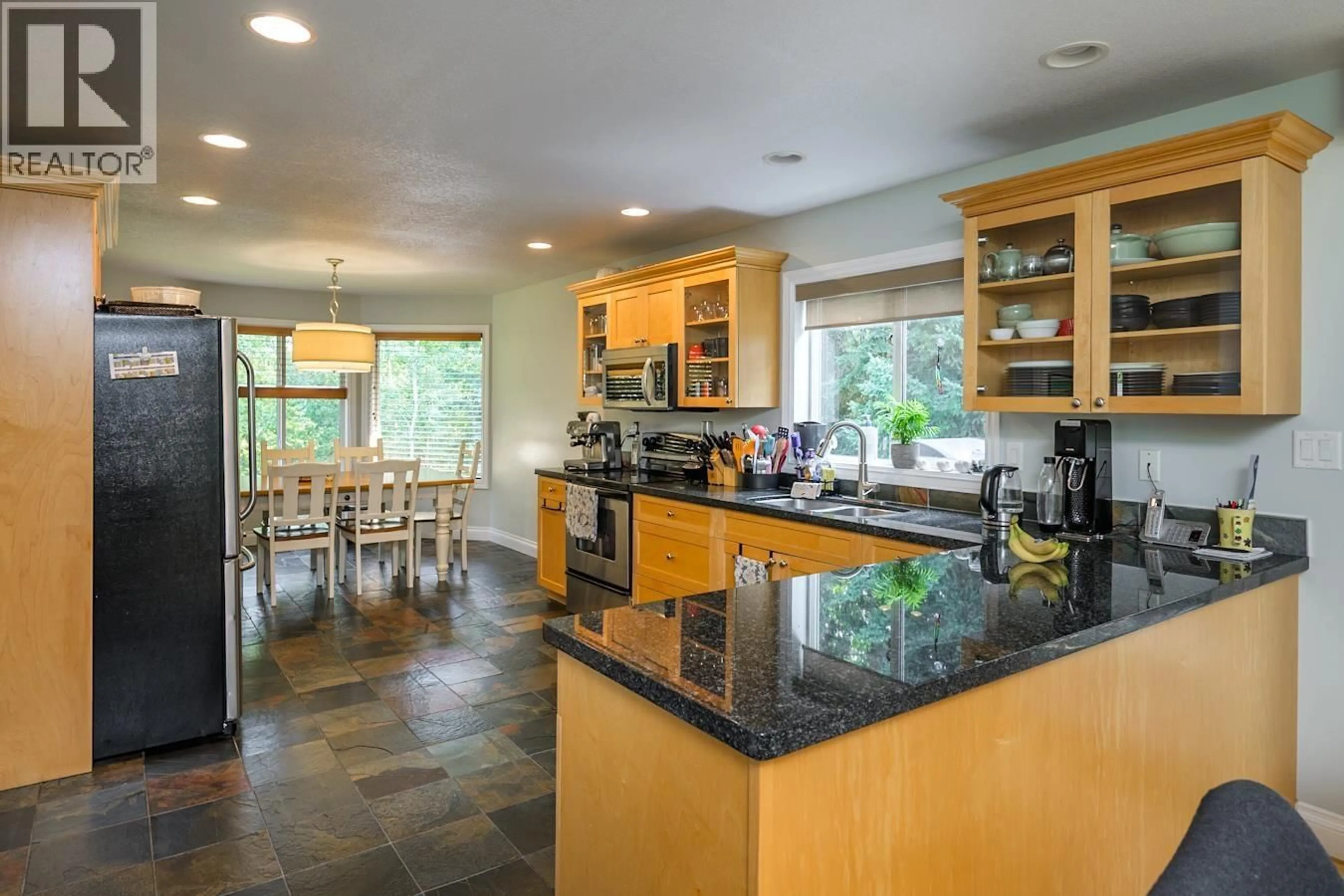 Open concept kitchen, ceramic/tile floor for 2505 BERNARD ROAD, Prince George British Columbia V2N5M1