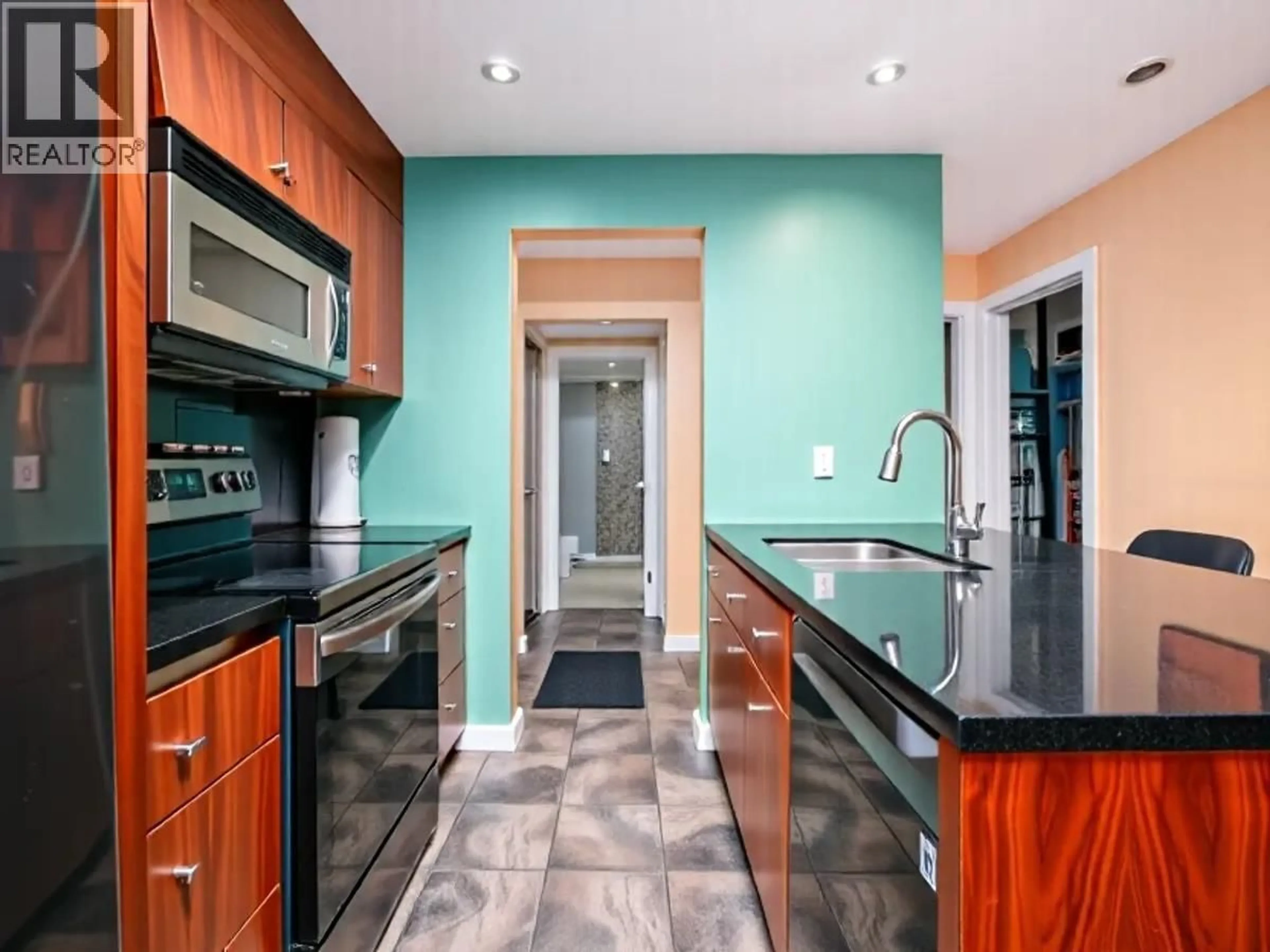 Contemporary kitchen, ceramic/tile floor for 103 - 212 FORBES AVENUE, North Vancouver British Columbia V7M3E5