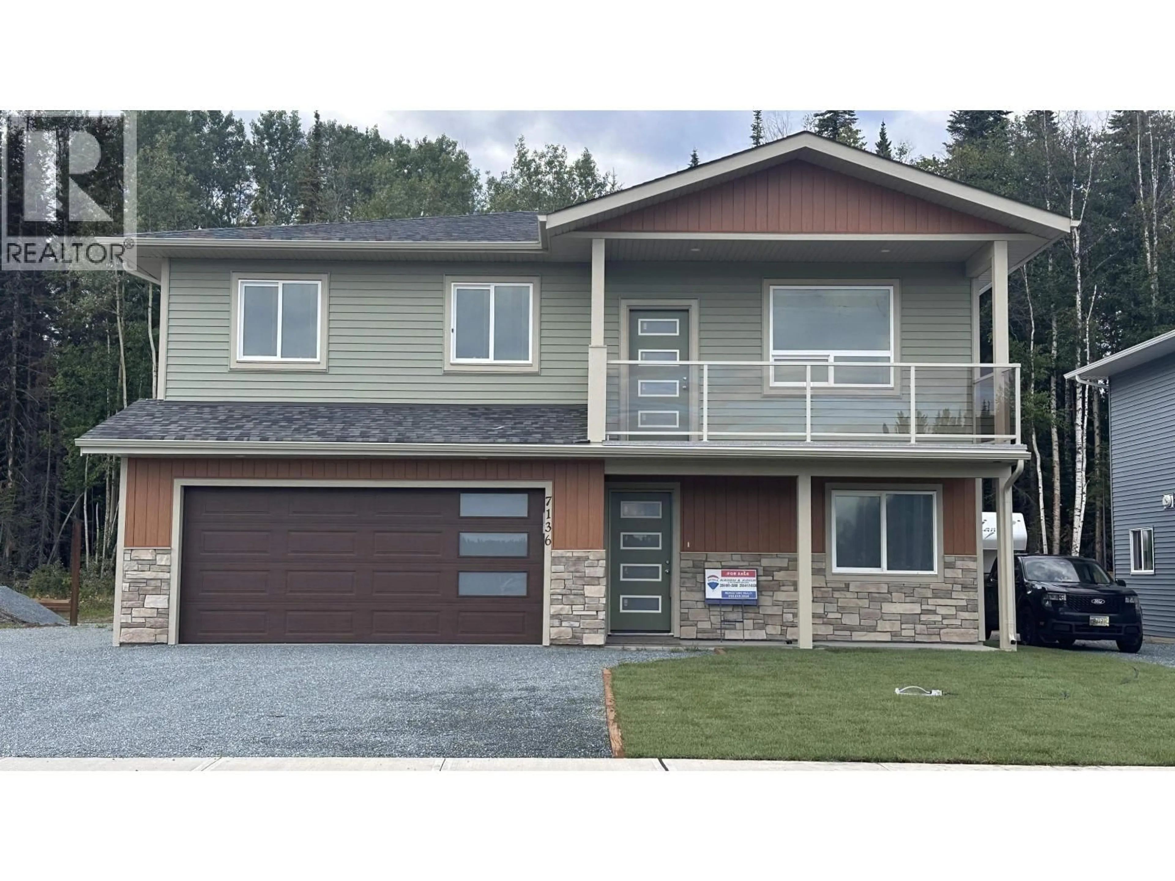 Home with vinyl exterior material, street for 7136 HILLU ROAD, Prince George British Columbia V2K0B4