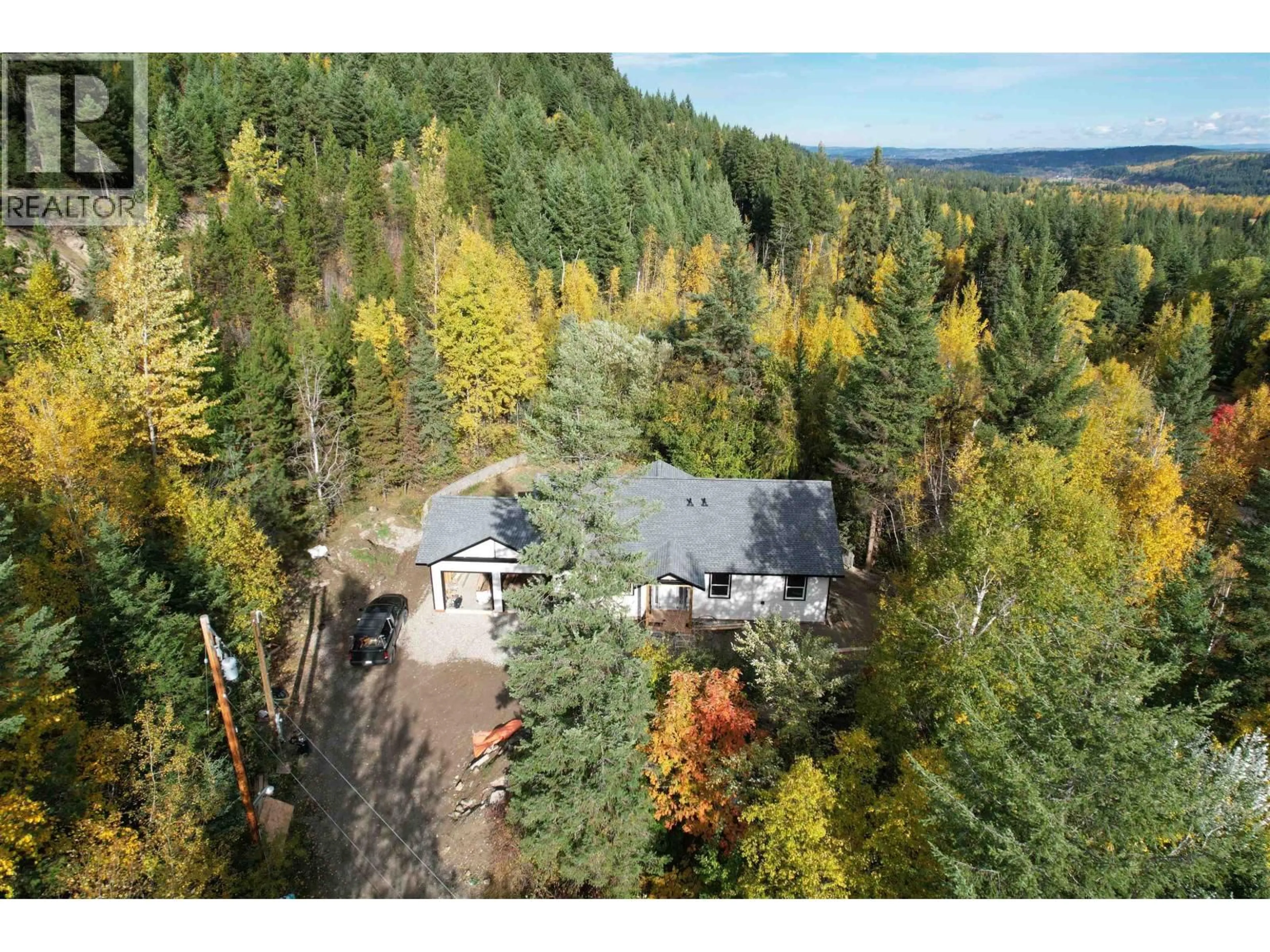 A pic from outside/outdoor area/front of a property/back of a property/a pic from drone, forest/trees view for 1980 HIGDON ROAD, Quesnel British Columbia V2J6J6