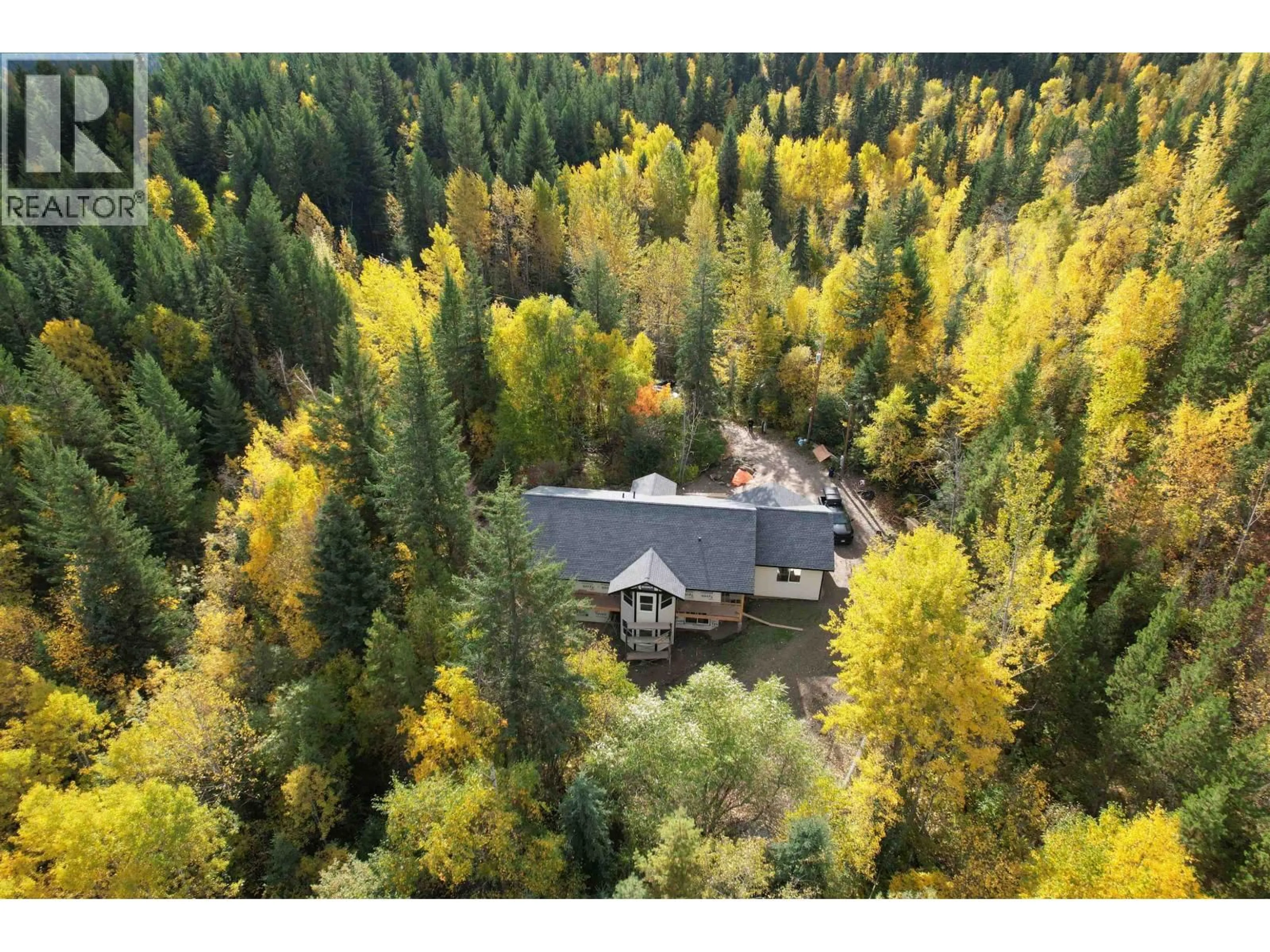 A pic from outside/outdoor area/front of a property/back of a property/a pic from drone, forest/trees view for 1980 HIGDON ROAD, Quesnel British Columbia V2J6J6