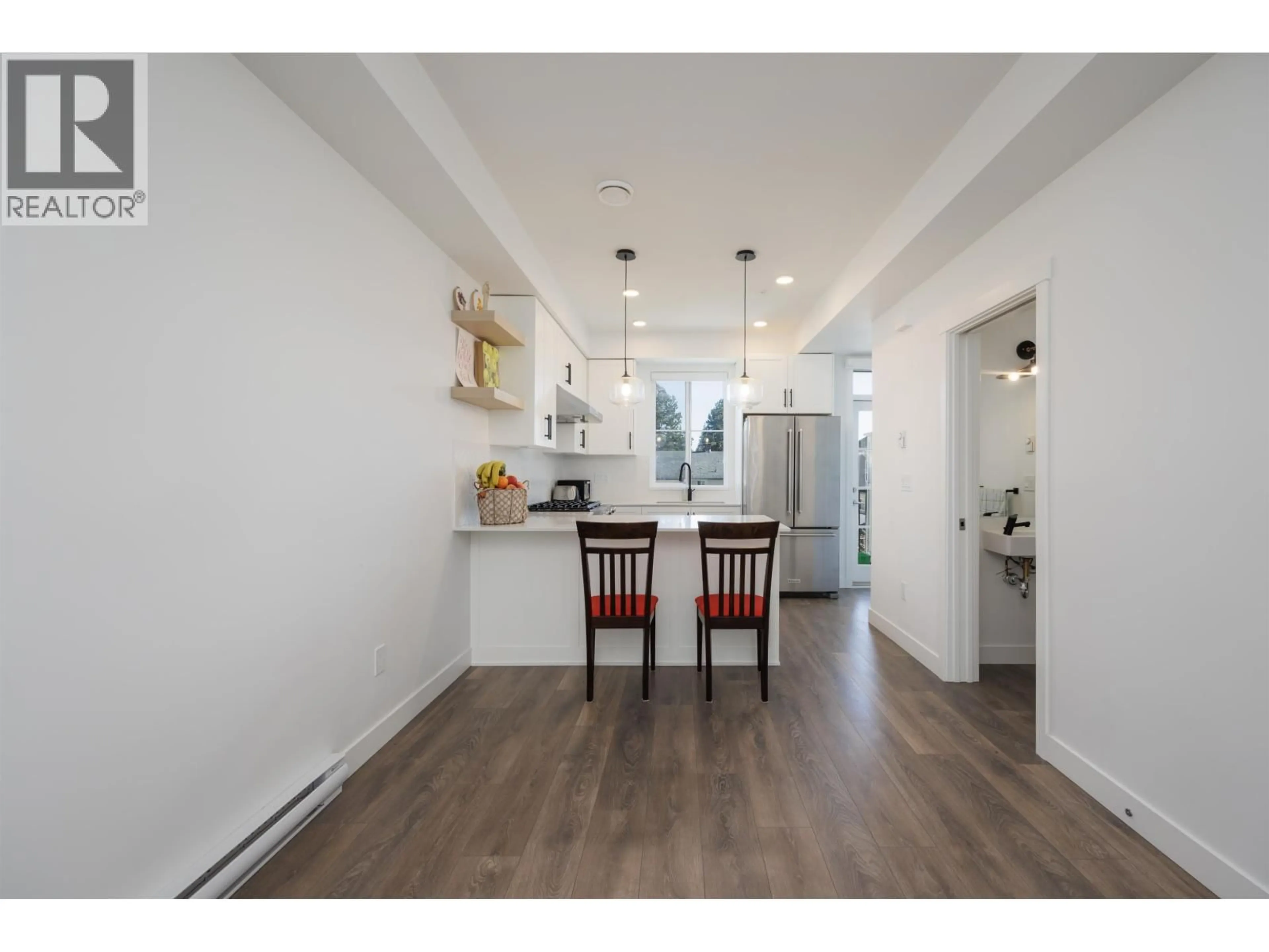 Open concept kitchen, wood/laminate floor for 119 - 707 ROBINSON STREET, Coquitlam British Columbia V3J0M9
