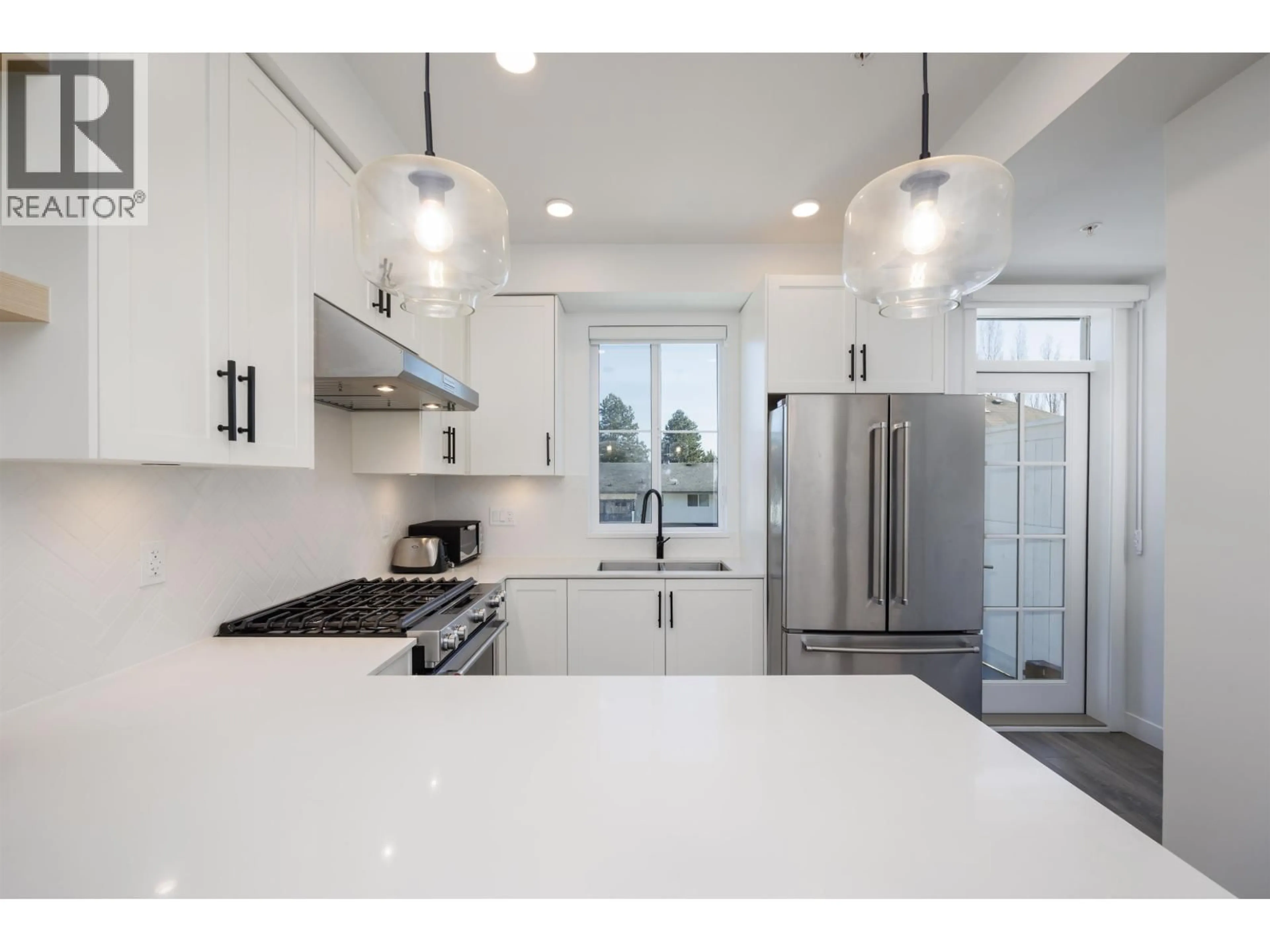 Open concept kitchen, ceramic/tile floor for 119 - 707 ROBINSON STREET, Coquitlam British Columbia V3J0M9