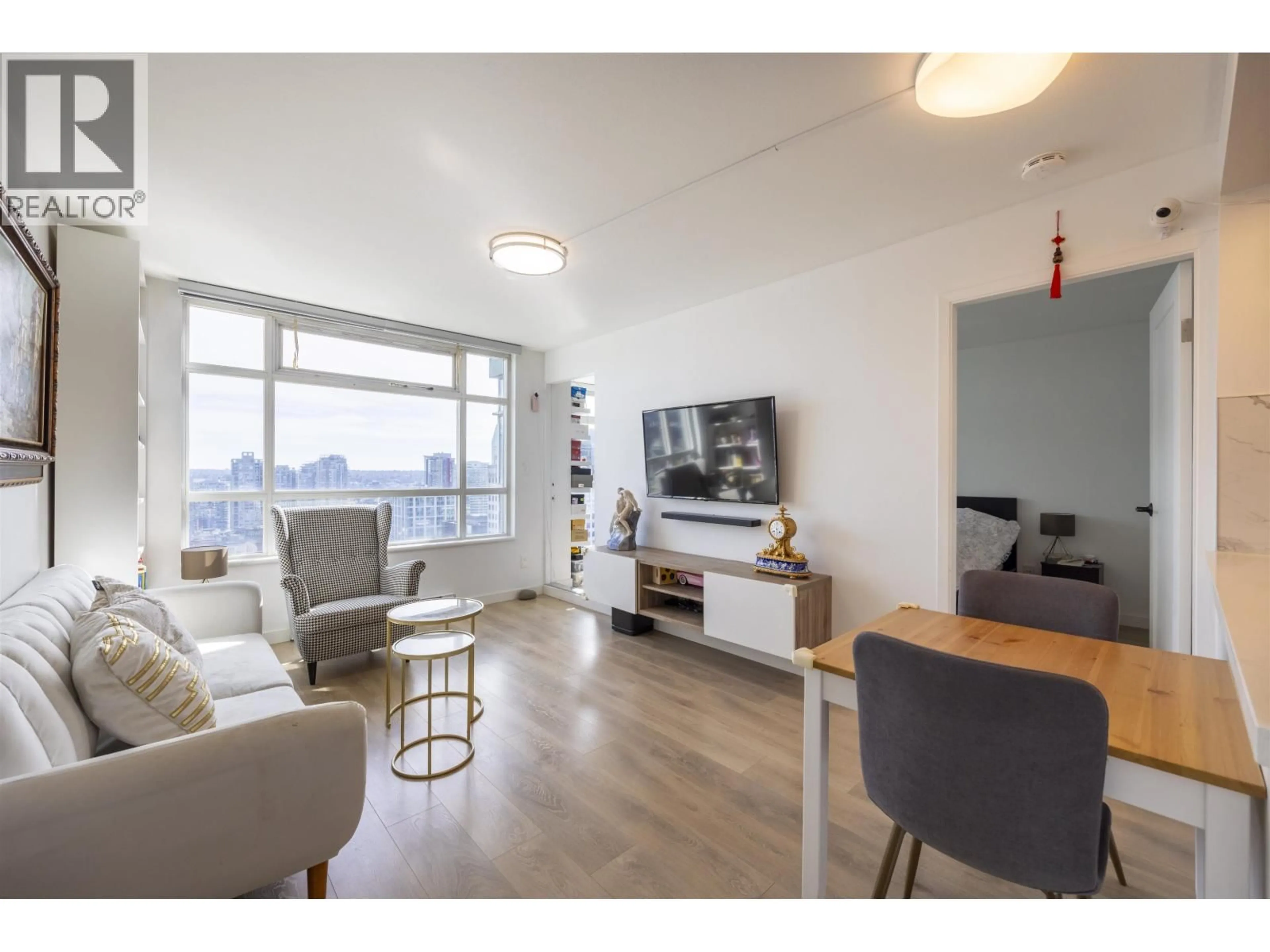 Living room with furniture, wood/laminate floor for 2508 - 438 SEYMOUR STREET, Vancouver British Columbia V6B6H4